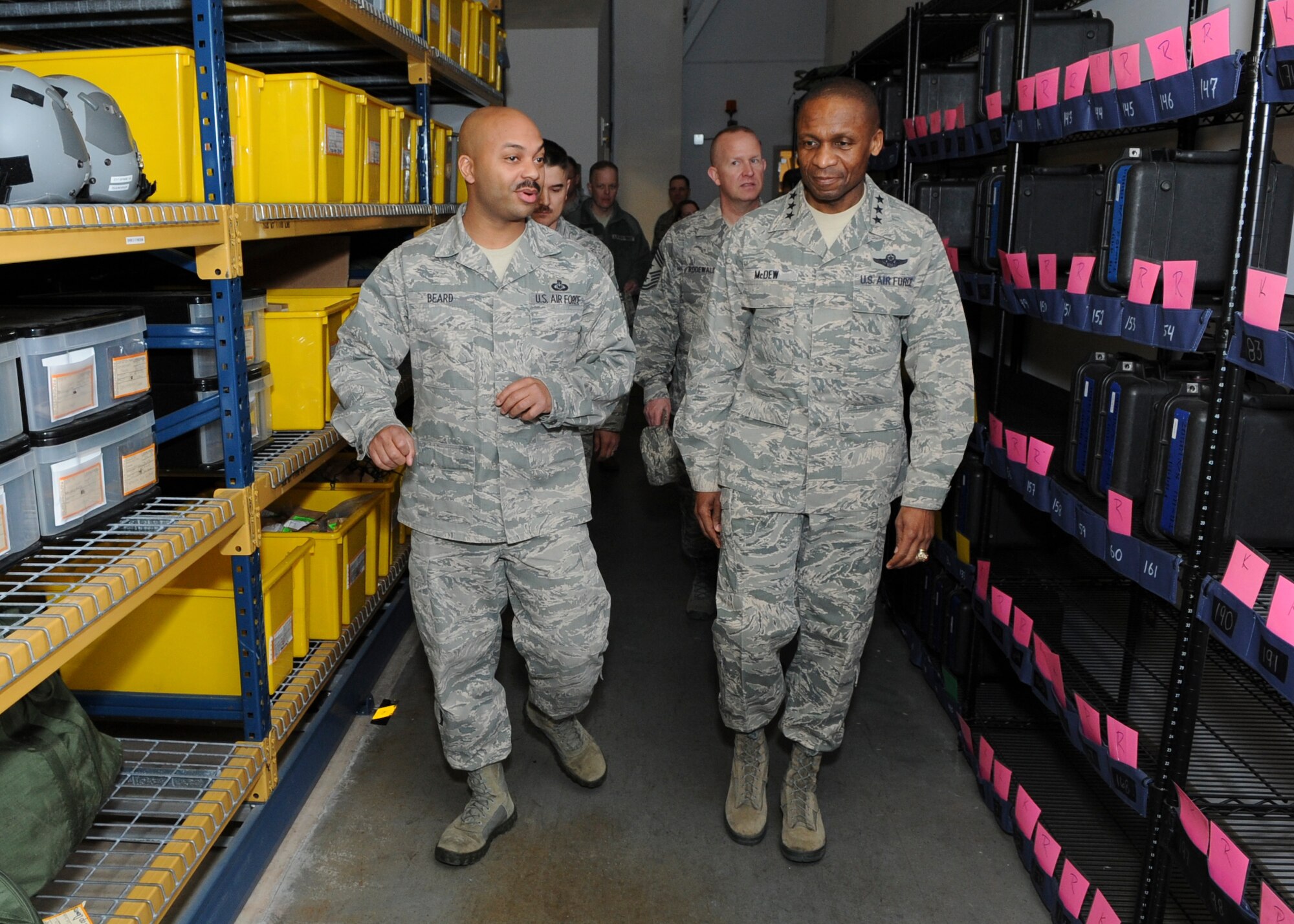 Master Sgt. Jamie Beard, 436th Operations Support Squadron aircrew flight equipment flight chief, gives Lt. Gen. Darren McDew, 18th Air Force commander, a tour of the aircrew flight equipment facility March 25, 2014, at Dover Air Force Base, Del. Lt. Gen. McDew visited Dover AFB to meet and speak with Airmen and to tour the base. (U.S. Air Force photo/Airman 1st Class Zachary Cacicia)