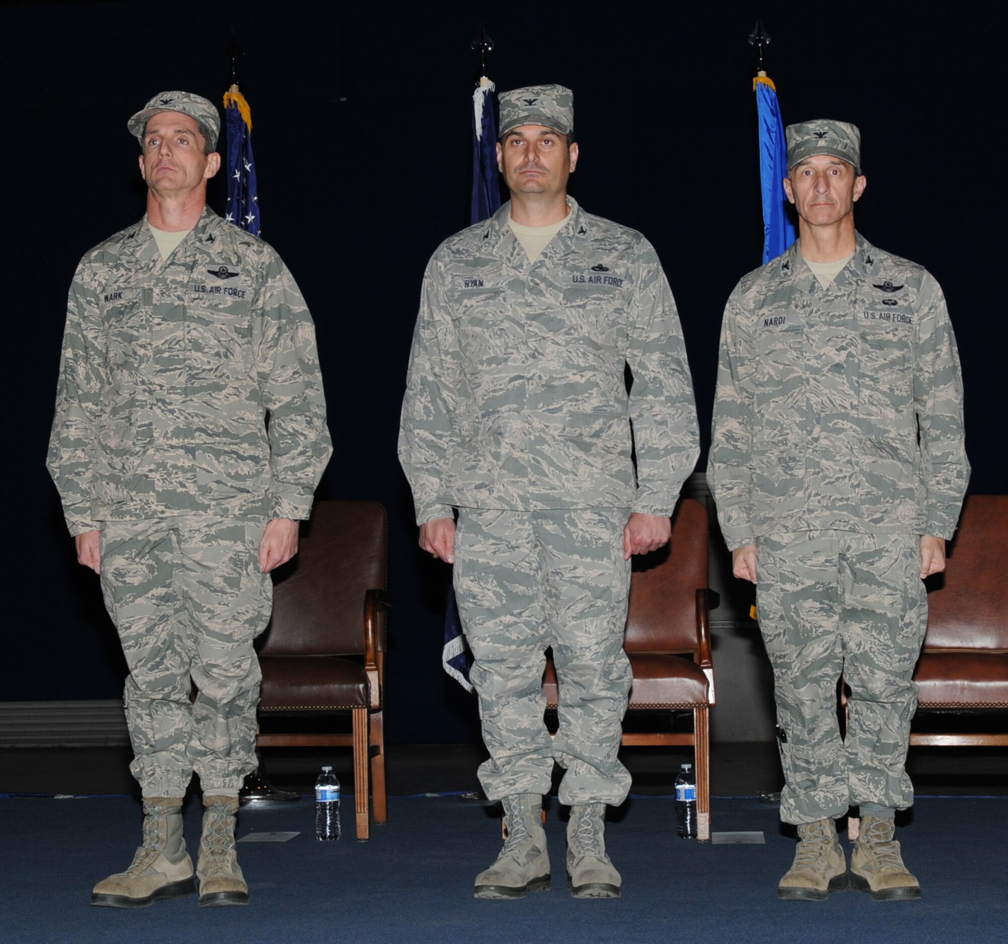 From left are U.S. Air Force Col. Keith Wark, 192nd Fighter Wing Commander, Col. Jeffrey L. Ryan, incoming 192nd Mission Support Group Commander and Col. David Nardi, outgoing 192nd FW MSG Commander, during a change of command at Langley Air Force Base, Va., March 23, 2014. (U.S. Air National Guard photo by Master Sgt. Carlos J. Claudio/Released)