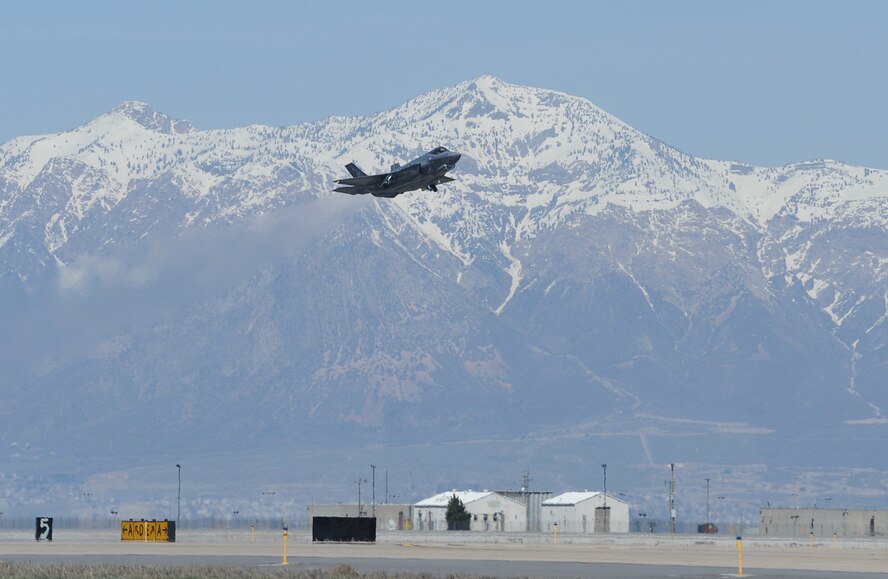 The first F-35 Lightning II to receive organic modifications at the Ogden Air Logistics Complex departed Hill Air Force Base March 25 for Nellis AFB, Nev., where it will undergo continued operational testing. The aircraft arrived at Hill AFB in September 2013 and received four structural modifications intended to strengthen areas of the aircraft and extends its service life. The Ogden ALC is expected to perform the series of modifications on a total of six F-35s this fiscal year. Eight F-35s are expected to be inducted into the depot in FY15. (U.S. Air Force photo by Alex R. Lloyd)
