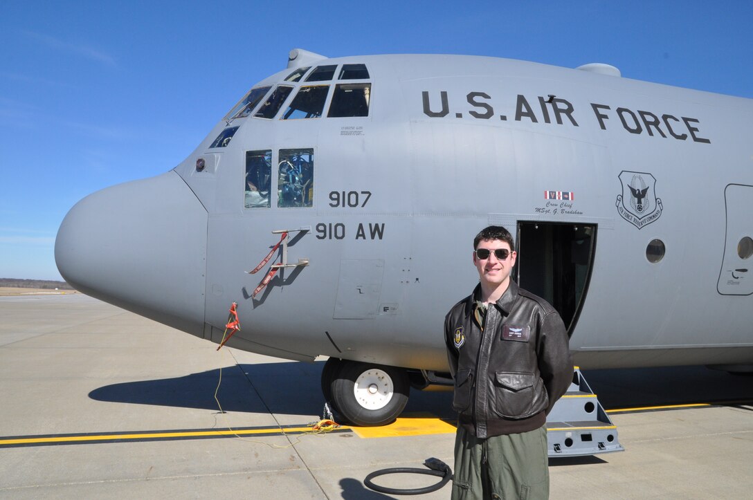 U.S. Air Force Reserve Capt. Casey Stedman, a navigator with the 773rd Airlift Squadron, poses is front of a Youngstown C-130H Hercules aircraft here. Stedman will spend four months in a geodesic dome, beginning March 28, 2014, as the mission commander for Hawai'i Space Exploration Analog and Simulation's (HI-SEAS) mission two, The mission is designed to simulate a long-term manned mission to Mars. Stedman is part of a six-person team. (U.S. Air Force photo/Master Sgt. Bob Barko, Jr.)