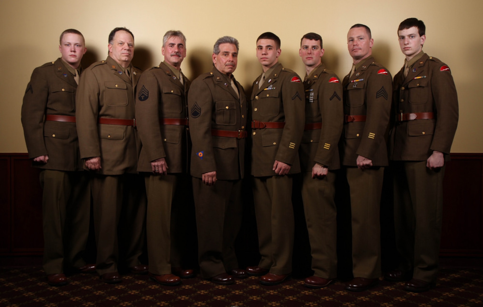 Re-enactors of the 78th Infantry Division World War II Living History Association display World War II-era uniforms and artifacts during the 78th Training Division’s annual Dining Out, March 15, 2014, at Joint Base McGuire-Dix-Lakehurst, N.J. (U.S. Army photo by Sgt. Errol Cadet/Released)