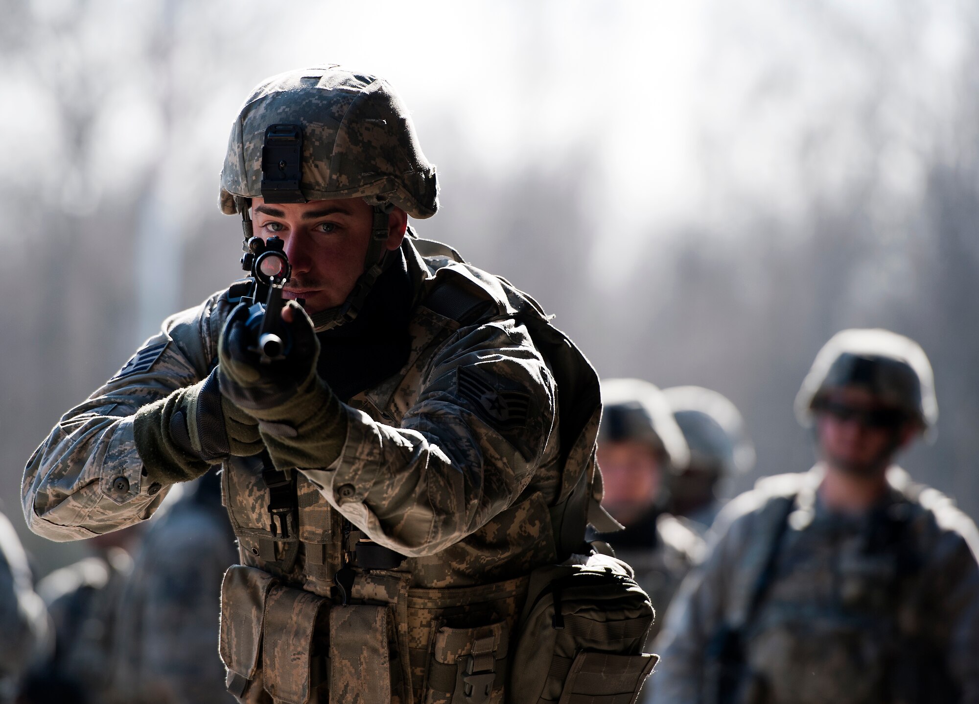Staff Sgt. Richard Phillips, 703rd Munitions Support Squadron custody force member, assaults a complex during the Battlefield Leaders, Assaulters Course, March 11, 2014, Ramstein Air Base, Germany. The 12-day course is designed to teach Airmen a variety of skills including proper weapon control while moving and how to proceed in situations where an asset has been taken by an oppositional force. (U.S. Air Force photo/Senior Airman Damon Kasberg)