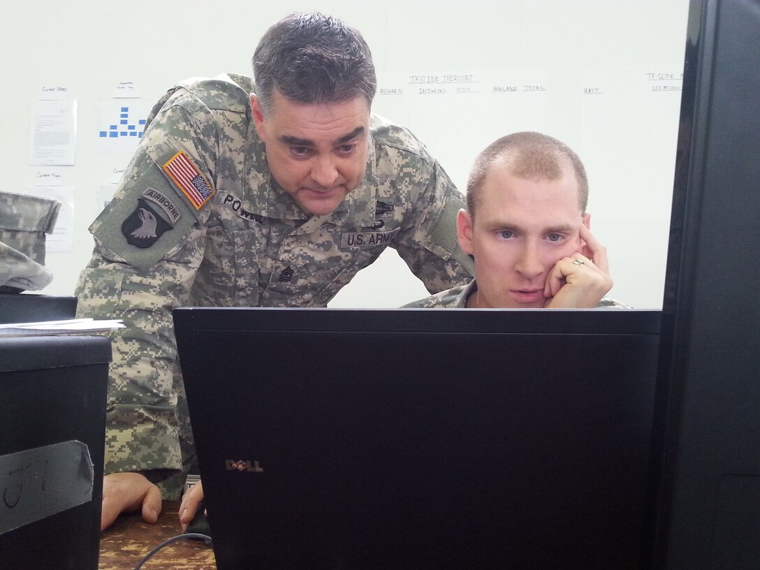 Army Sgt. Maj. Shawn Powell and Capt. Nicholas Winters discuss military