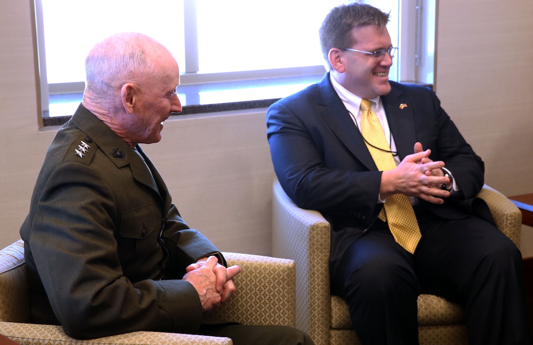 Lieutenant Gen. Richard Tryon, commander of U.S. Marine Corps Forces Command and U.S. Marine Corps Forces, Europe, meets with Dean Thompson, Acting U.S. deputy chief of mission for the U.S. embassy in Bucharest at the embassy March 18, 2014. Tryon visited Bucharest to talk with military officials, and he also visited the embassy while he was there. (Official Marine Corps photo by Lance Cpl. Scott W. Whiting, BSRF PAO/ Released)