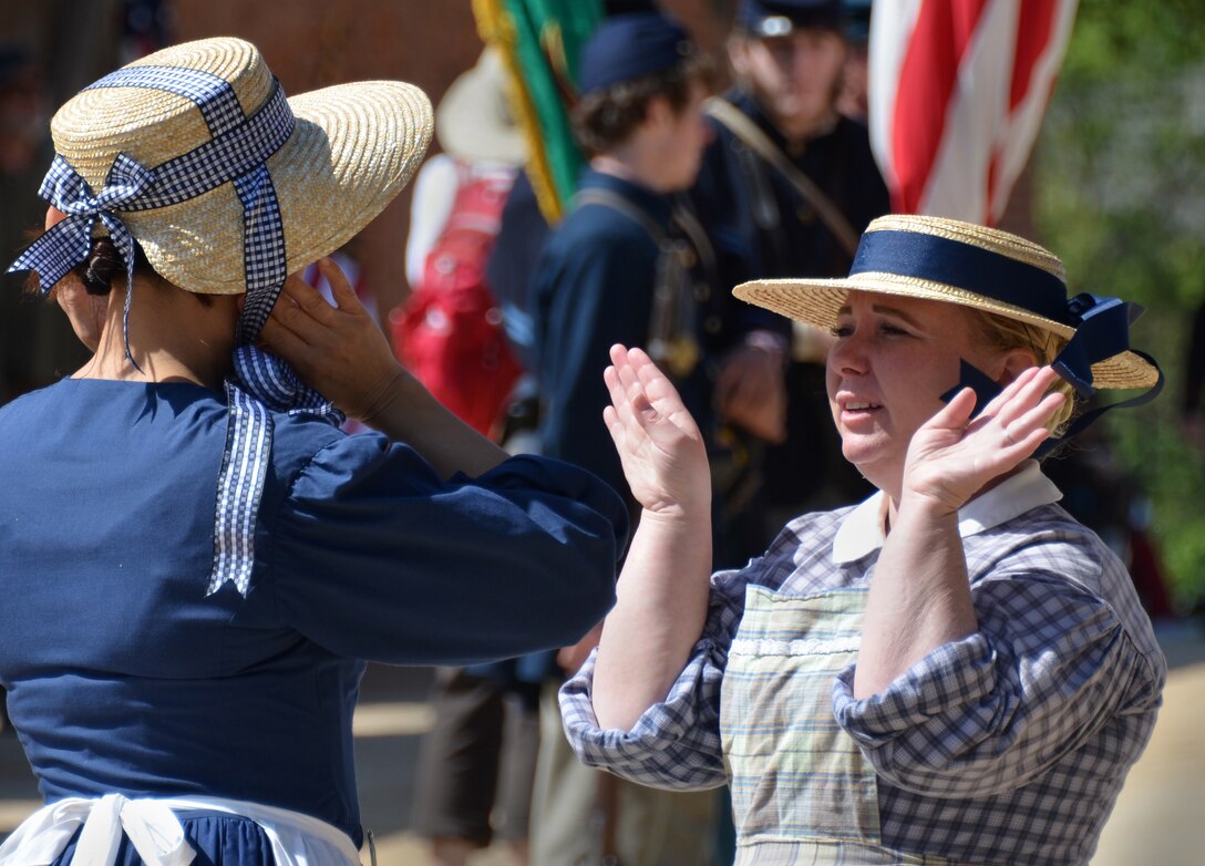 Women in period costumes react to cannon fire during a Civil War reenactment at the U.S. Army Corps of Engineers Sacramento District’s Stanislaus River Parks in Knights Ferry, Calif., March 22, 2014. Sacramento District employees and hundreds of history buffs gathered in Knights Ferry to officially commemorate attaining National Historic Landmark status for the 300-foot-long covered bridge in the historic 19th-century township.