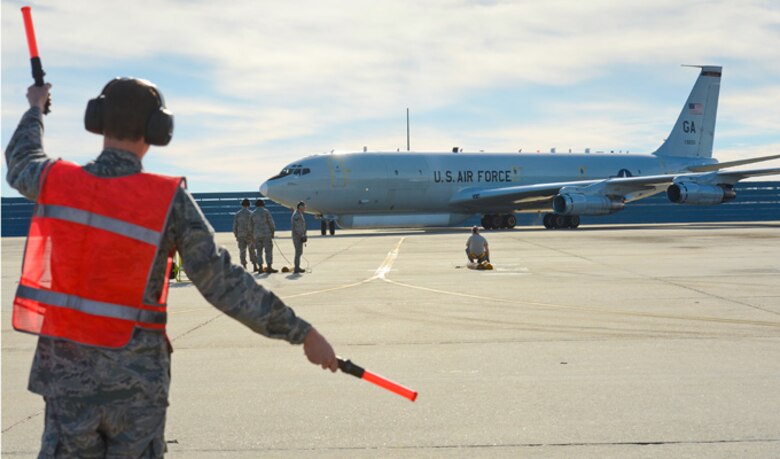 An E-8C Joint STARS returns after completing a mission to perform an initial test of the Joint Range Extension Applications Protocol (JREAP-C) system, Feb. 5, 2014, at Robins Air Force Base, Ga. The JREAP-C technology will allow JSTARS operators to receive and transmit data beyond line of sight to more joint agencies at a farther distance than previously possible. (U.S. Air National Guard photo/Master Sgt. Roger Parsons)