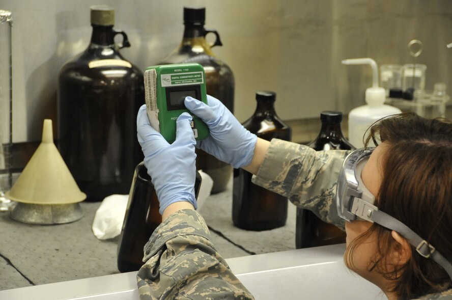 U.S. Air Force Airman 1st Class Jamie Von Barnau Sythoff, 35th Logistics Readiness Squadron fuels laboratory technician, performs a conductivity test on JP-8 fuel at Misawa Air Base, Japan, March 25, 2014. After calibrating the meter, a probe is inserted into the fuel to obtain an accurate readout before being sent to the flightline. Technicians test for any impurities in the fuel and ensure no excess water is present. (U.S. Air Force photo/Airman 1st Class Patrick S. Ciccarone)