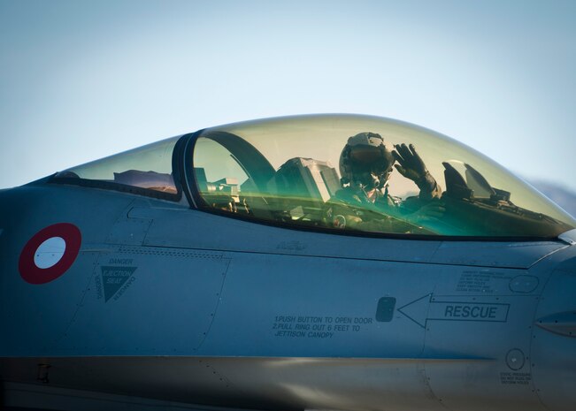 A Royal Danish air force pilot taxi’s to the active runway at Nellis Air Force Base March 27, 2014.  RDAF pilots are training with joint terminal attack controllers on close air support during Green Flag 14-5. (U.S. Air Force photo by Airman 1st Class Jake Carter)