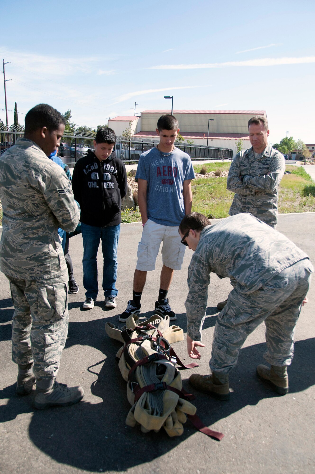 Students from River City High School’s Junior Reserve Officers Training Corps visited Travis Air Force Base, Calif., to learn about the Team Travis mission, March 21. The students, who are from West Sacramento, toured the installation, learning about the air traffic control, firefighter, explosive ordinance disposal and security forces career fields. Retired Col. Russell Warner, a senior aerospace science instructor for River City High’s JROTC program, explained that although this was the school’s first tour to Travis Air Force Base, the initial feedback from students was extremely positive and he hoped to bring future groups to the base. (U.S. Air Force photo/Senior Airman Cindy G. Alejandrez)