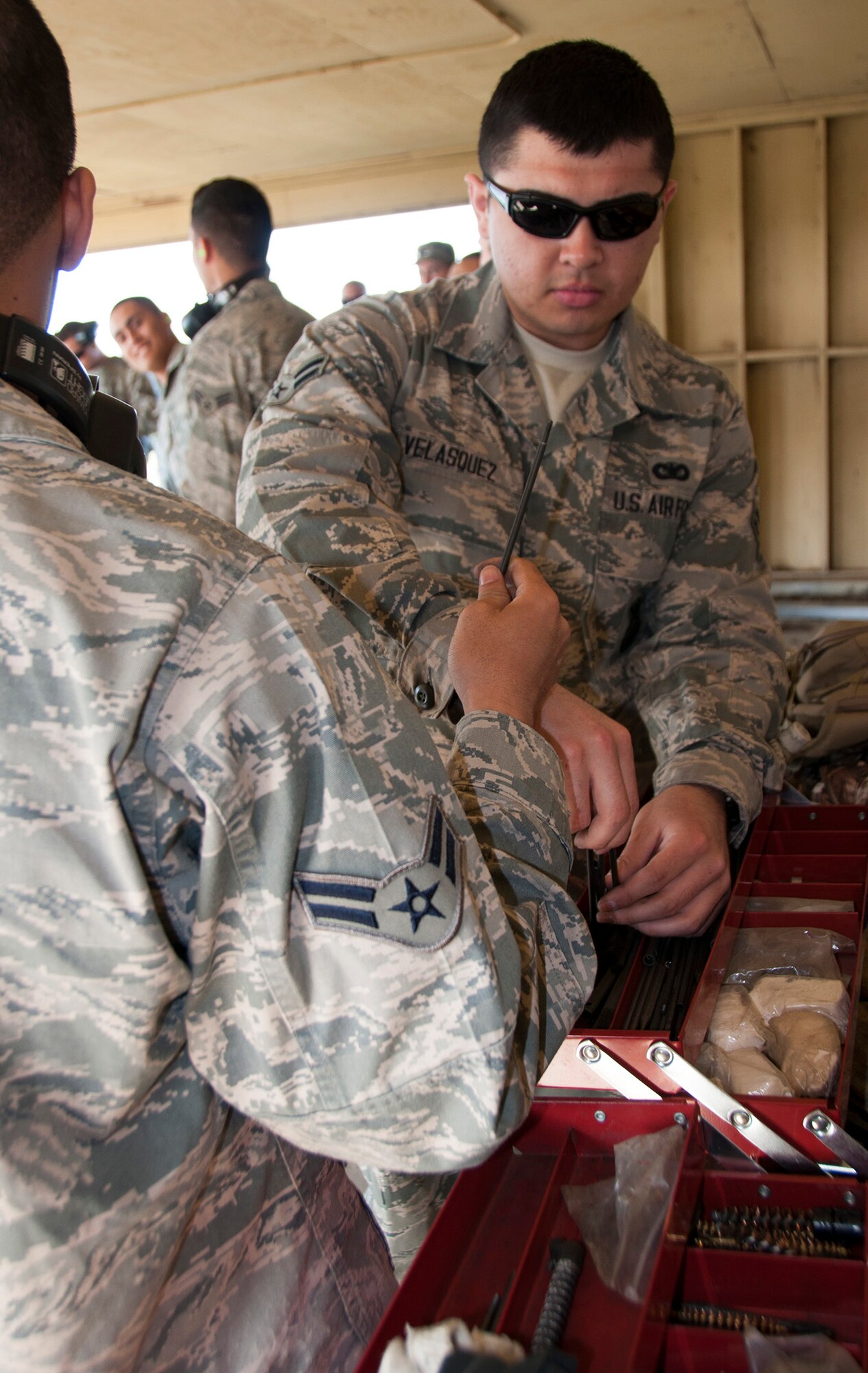TRAVIS AIR FORCE BASE, Calif. -- Reservists from the 349th Security Forces Squadron and 349th Civil Engineer Squadron Explosives Ordnance flight traveled to Beale Air Force Base, Calif., to further familiarize their members with the M240 and M249 heavy weapons, as well as with the M203 mounted grenade launcher, March 23, 2014. (U.S. Air Force photo/Senior Airman Cindy G. Alejandrez)