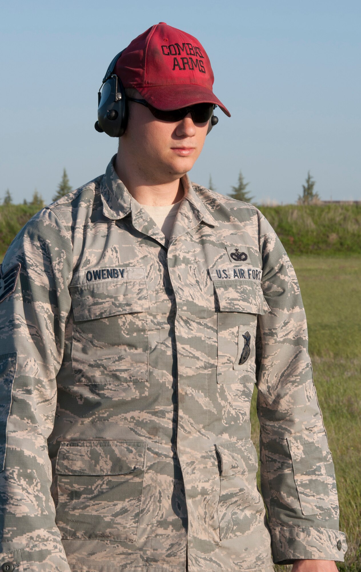 TRAVIS AIR FORCE BASE, Calif. -- Reservists from the 349th Security Forces Squadron and 349th Civil Engineer Squadron Explosives Ordnance flight traveled to Beale Air Force Base, Calif., to further familiarize their members with the M240 and M249 heavy weapons, as well as with the M203 mounted grenade launcher, March 23, 2014. (U.S. Air Force photo/Senior Airman Cindy G. Alejandrez)