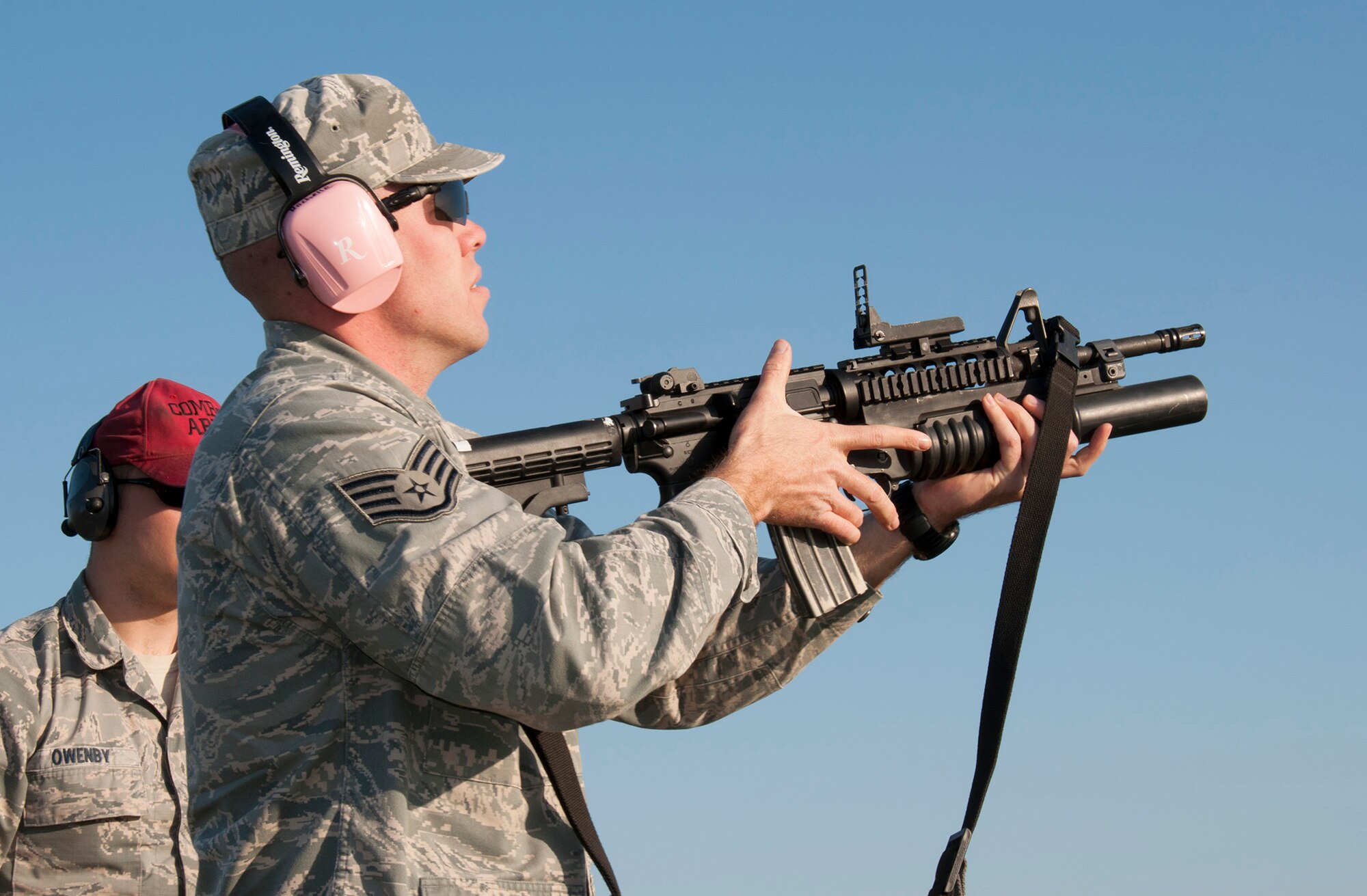 TRAVIS AIR FORCE BASE, Calif. -- Reservists from the 349th Security Forces Squadron and 349th Civil Engineer Squadron Explosives Ordnance flight traveled to Beale Air Force Base, Calif., to further familiarize their members with the M240 and M249 heavy weapons, as well as with the M203 mounted grenade launcher, March 23, 2014. (U.S. Air Force photo/Senior Airman Cindy G. Alejandrez)