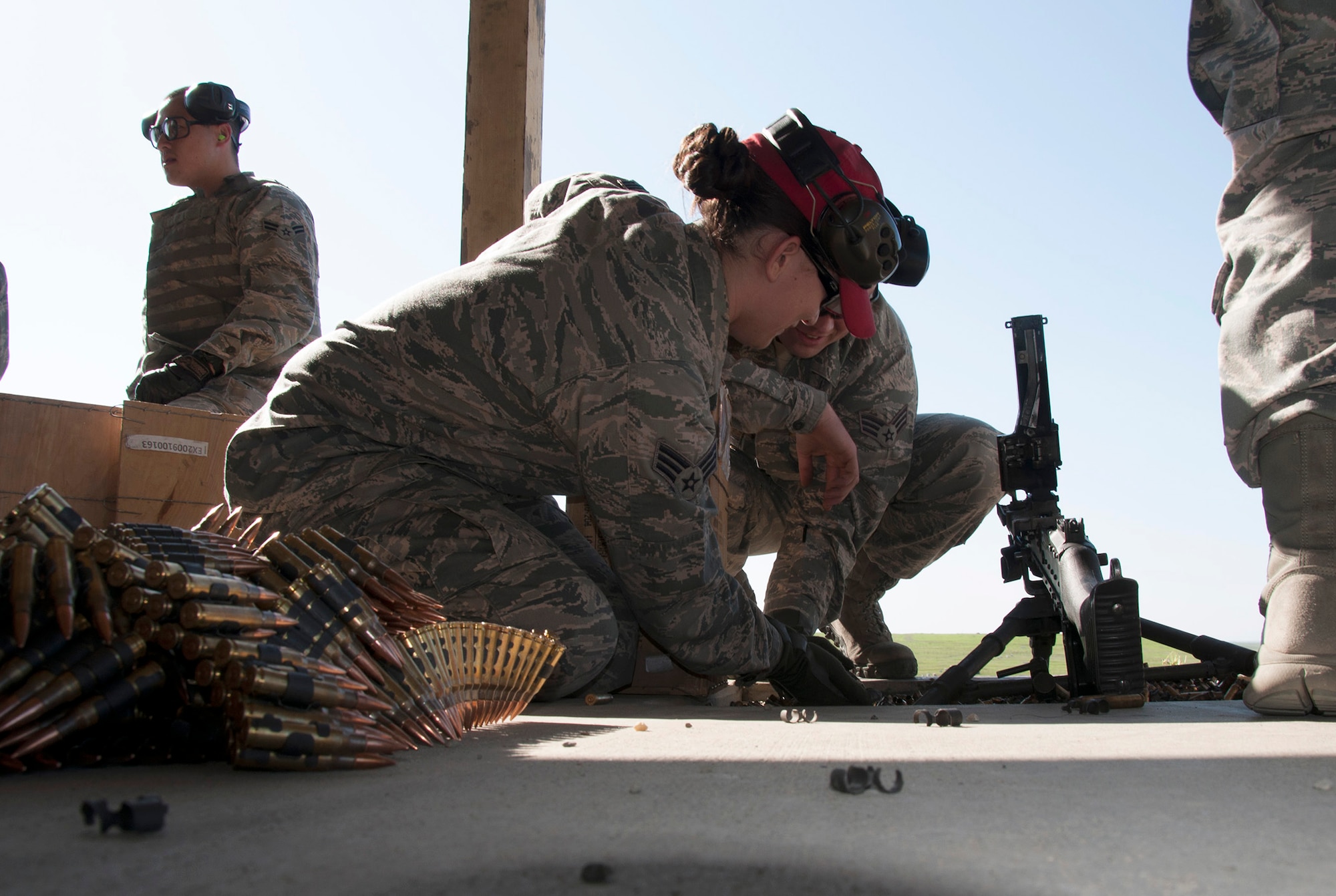 TRAVIS AIR FORCE BASE, Calif. -- Reservists from the 349th Security Forces Squadron and 349th Civil Engineer Squadron Explosives Ordnance flight traveled to Beale Air Force Base, Calif., to further familiarize their members with the M240 and M249 heavy weapons, as well as with the M203 mounted grenade launcher, March 23, 2014. (U.S. Air Force photo/Senior Airman Cindy G. Alejandrez)