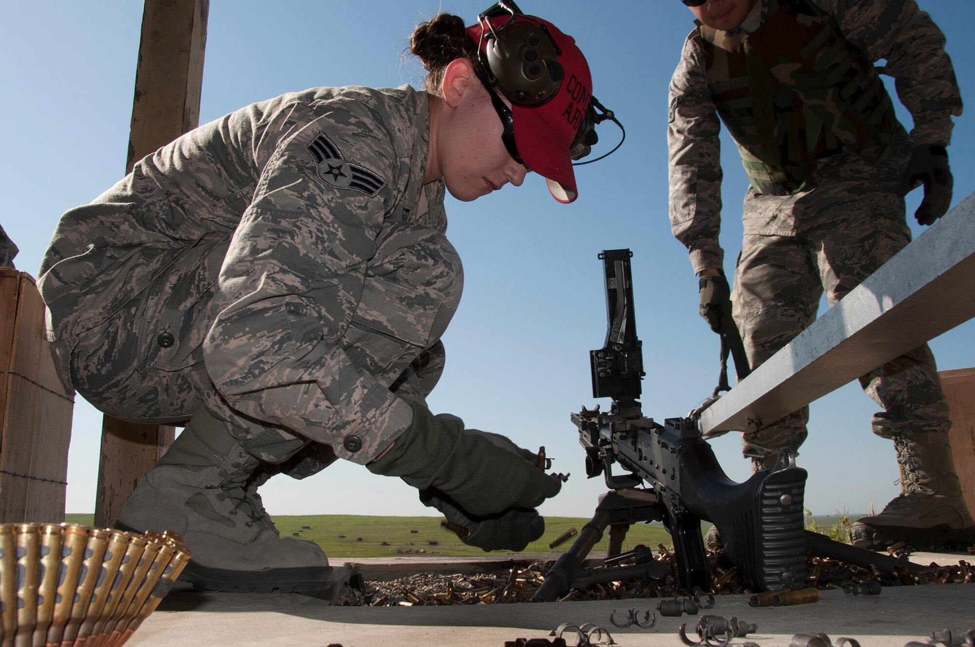 TRAVIS AIR FORCE BASE, Calif. -- Reservists from the 349th Security Forces Squadron and 349th Civil Engineer Squadron Explosives Ordnance flight traveled to Beale Air Force Base, Calif., to further familiarize their members with the M240 and M249 heavy weapons, as well as with the M203 mounted grenade launcher, March 23, 2014. (U.S. Air Force photo/Senior Airman Cindy G. Alejandrez)