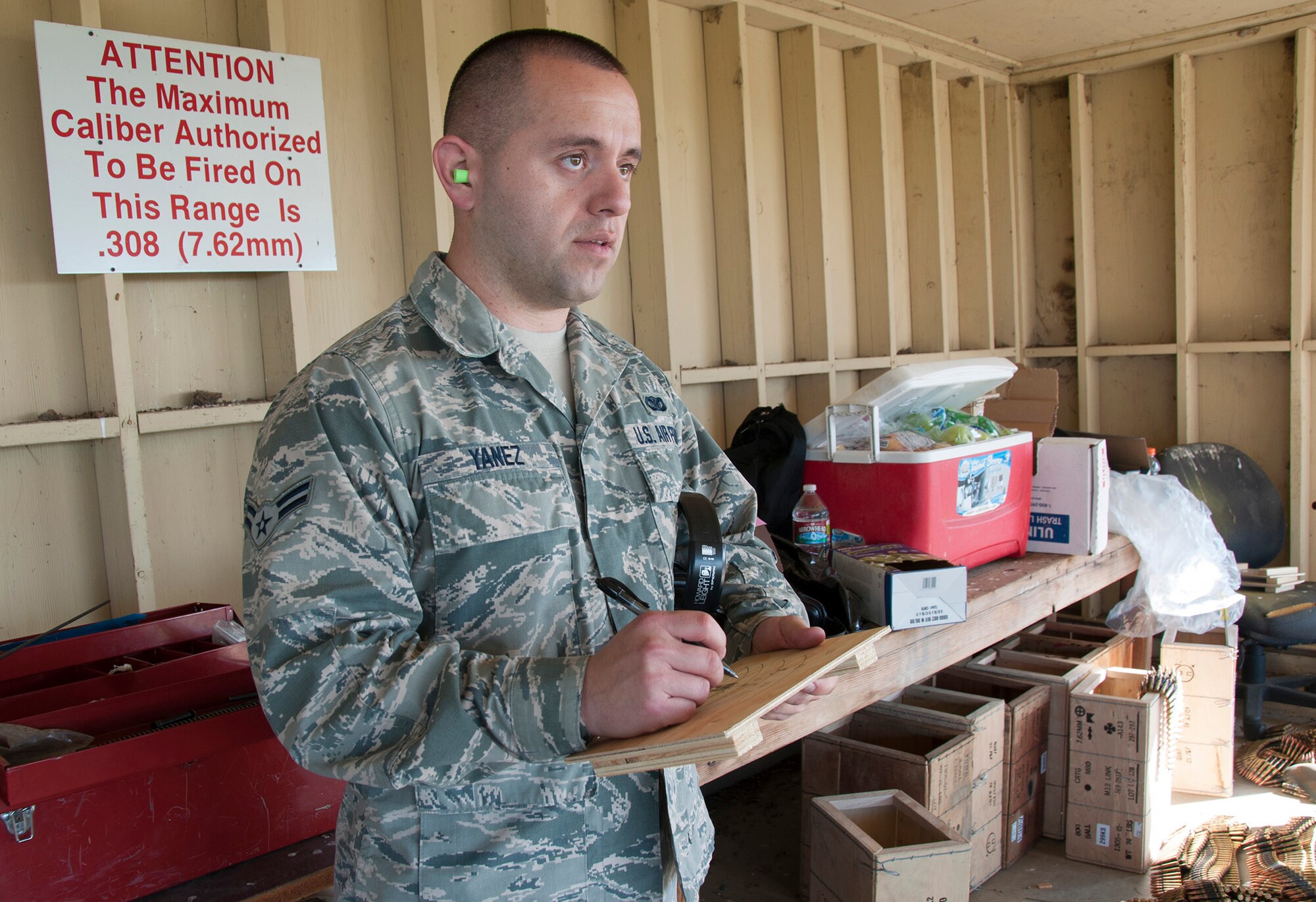TRAVIS AIR FORCE BASE, Calif. -- Reservists from the 349th Security Forces Squadron and 349th Civil Engineer Squadron Explosives Ordnance flight traveled to Beale Air Force Base, Calif., to further familiarize their members with the M240 and M249 heavy weapons, as well as with the M203 mounted grenade launcher, March 23, 2014. (U.S. Air Force photo/Senior Airman Cindy G. Alejandrez)