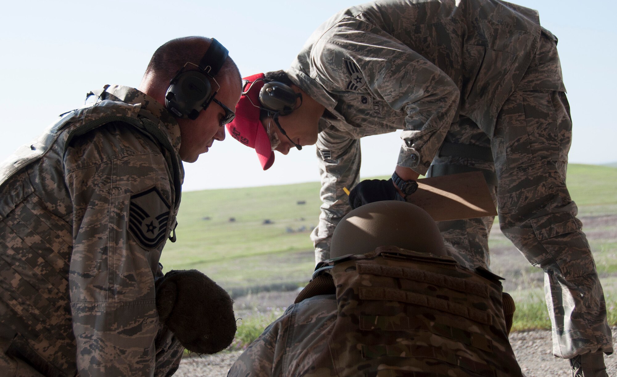 TRAVIS AIR FORCE BASE, Calif. -- Reservists from the 349th Security Forces Squadron and 349th Civil Engineer Squadron Explosives Ordnance flight traveled to Beale Air Force Base, Calif., to further familiarize their members with the M240 and M249 heavy weapons, as well as with the M203 mounted grenade launcher, March 23, 2014. (U.S. Air Force photo/Senior Airman Cindy G. Alejandrez)