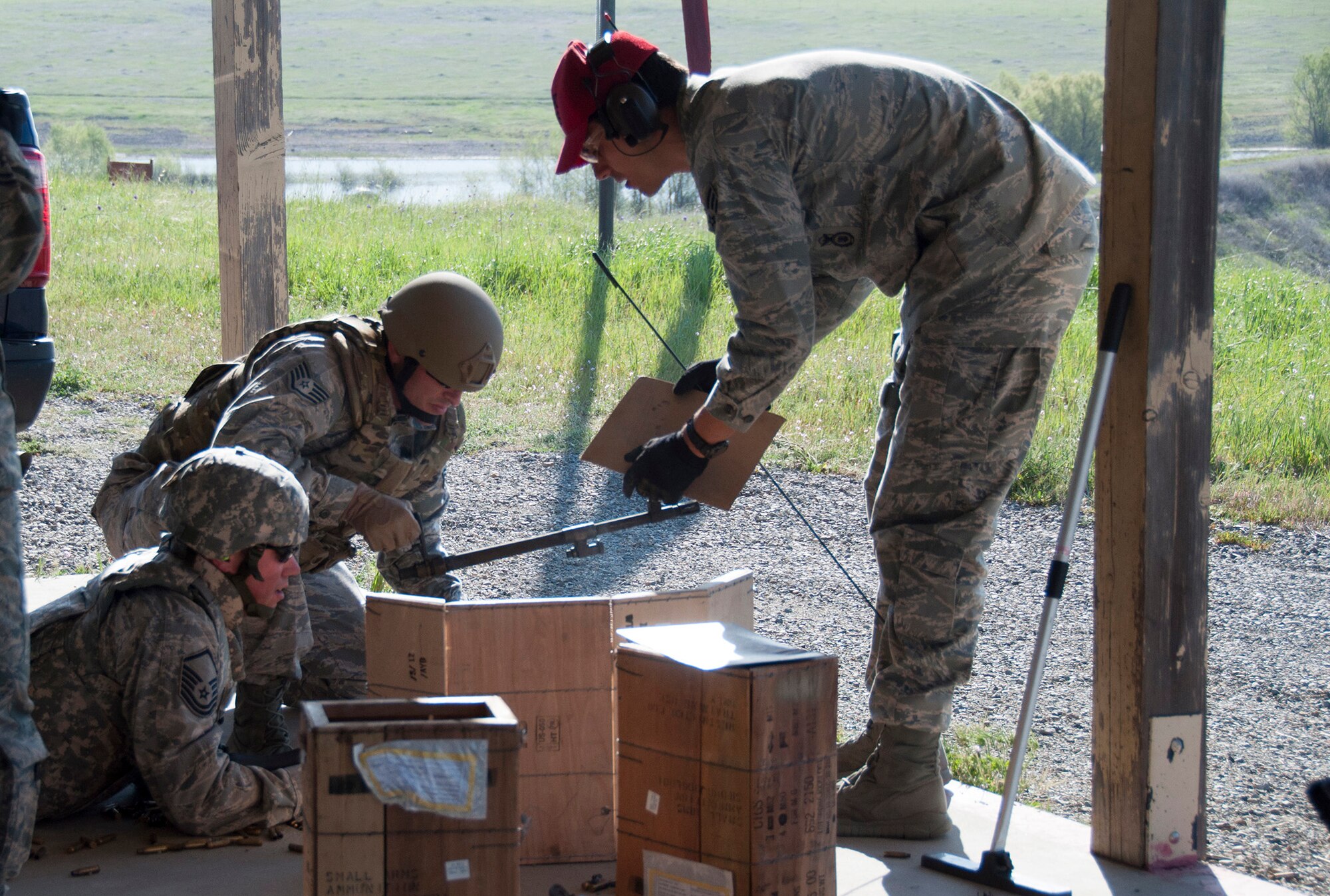 TRAVIS AIR FORCE BASE, Calif. -- Reservists from the 349th Security Forces Squadron and 349th Civil Engineer Squadron Explosives Ordnance flight traveled to Beale Air Force Base, Calif., to further familiarize their members with the M240 and M249 heavy weapons, as well as with the M203 mounted grenade launcher, March 23, 2014. (U.S. Air Force photo/Senior Airman Cindy G. Alejandrez)