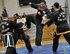 Retired Master Sgt. Amado Garcia, previously assigned to the 96th Aircraft Maintenance Squadron, Eglin Air Force Base, Fla., simultaneously breaks three boards during a Kuk Sool Won Black Belt Demo at the Aderholt Fitness Center on Hurlburt Field, Fla, March 23, 2014. Garcia is a 5th degree black belt of Kuk Sool Won. (U.S. Air Force photo/Senior Airman Kentavist P. Brackin) 
