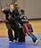 Retired Master Sgt. Amado Garcia, previously assigned to 96th Aircraft Maintenance Squadron, Eglin Air Force Base, Fla., forces back two opponents during a Kuk Sool Won Black Belt Demo at the Aderholt Fitness Center on Hurlburt Field, Fla, March 22, 2014. Kuk Sool Won is a traditional Korean martial art which uses techniques dating back more than 5,000 years. (U.S. Air Force photo/Senior Airman Kentavist P. Brackin) 