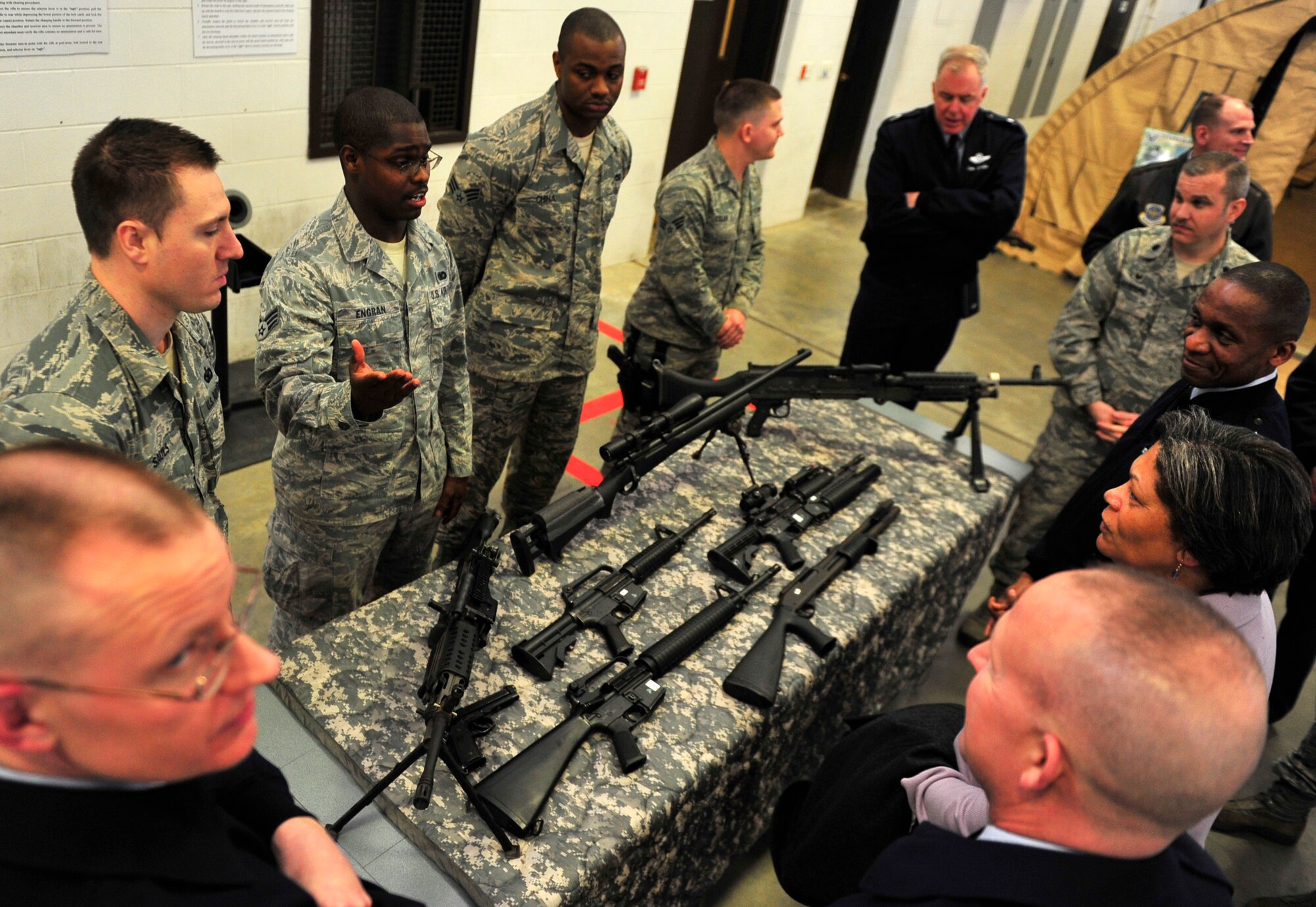 Members from the 621st Contingency Response Wing brief Lt. Gen. Darren McDew, 18th Air Force commander, about weapons in the CRW during his at the Global Reach Deployment Center at Joint Base McGuire-Dix-Lakehurst, N.J., Mar. 26. (U.S. Air Force photo by Staff Sgt. Gustavo Gonzalez)