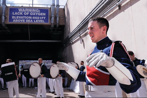 Cadet 1st Class Ford Carty, shown here performing with the Drum and Bugle Corps at the Academy, won a research award for best undergraduate research poster from the American Chemical Society's Division of Polymer Chemistry this month. (U.S. Air Force Photo/Mike Kaplan)