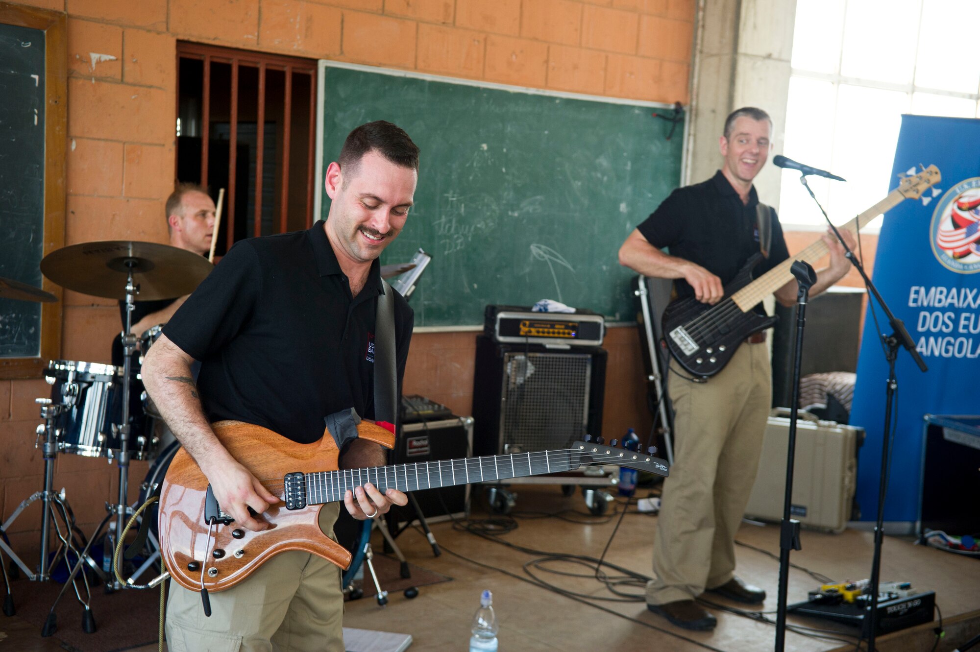 The U.S. Air Forces in Europe Band ensemble Touch n' Go play a song for students at the Dom Bosco School in Luanda, Angola, March 26, 2014. The band is in Angola as part of African Partnership Flight Angola 2014, which is an event providing a collaborative learning environment for the Angolan, U.S. and Zambian air forces. (U.S. Air Force photo/Tech. Sgt. Benjamin Wilson)(Released)
