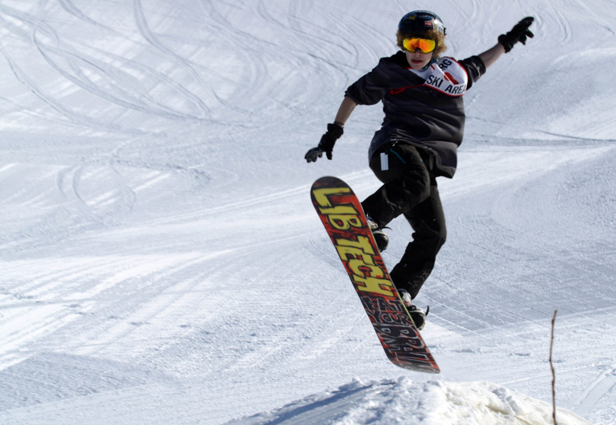 JOINT BASE ELMENDORF-RICHARDSON-- Connor Duffy, 15, performs a method air snowboarding trick during the 673d Force Support Squadron?s Spring Meltdown event at the Hillberg Ski area on Joint Base Elmendorf-Richardson, Alaska, March 22, 2014. The event included the commanders? bobsled race, a terrain park competition, an up-hill/down-hill race and the Slush Cup competition. Duffy took first place in the terrain park snowboard competition. (U.S. Air Force photo/Staff Sgt. Sheila deVera)