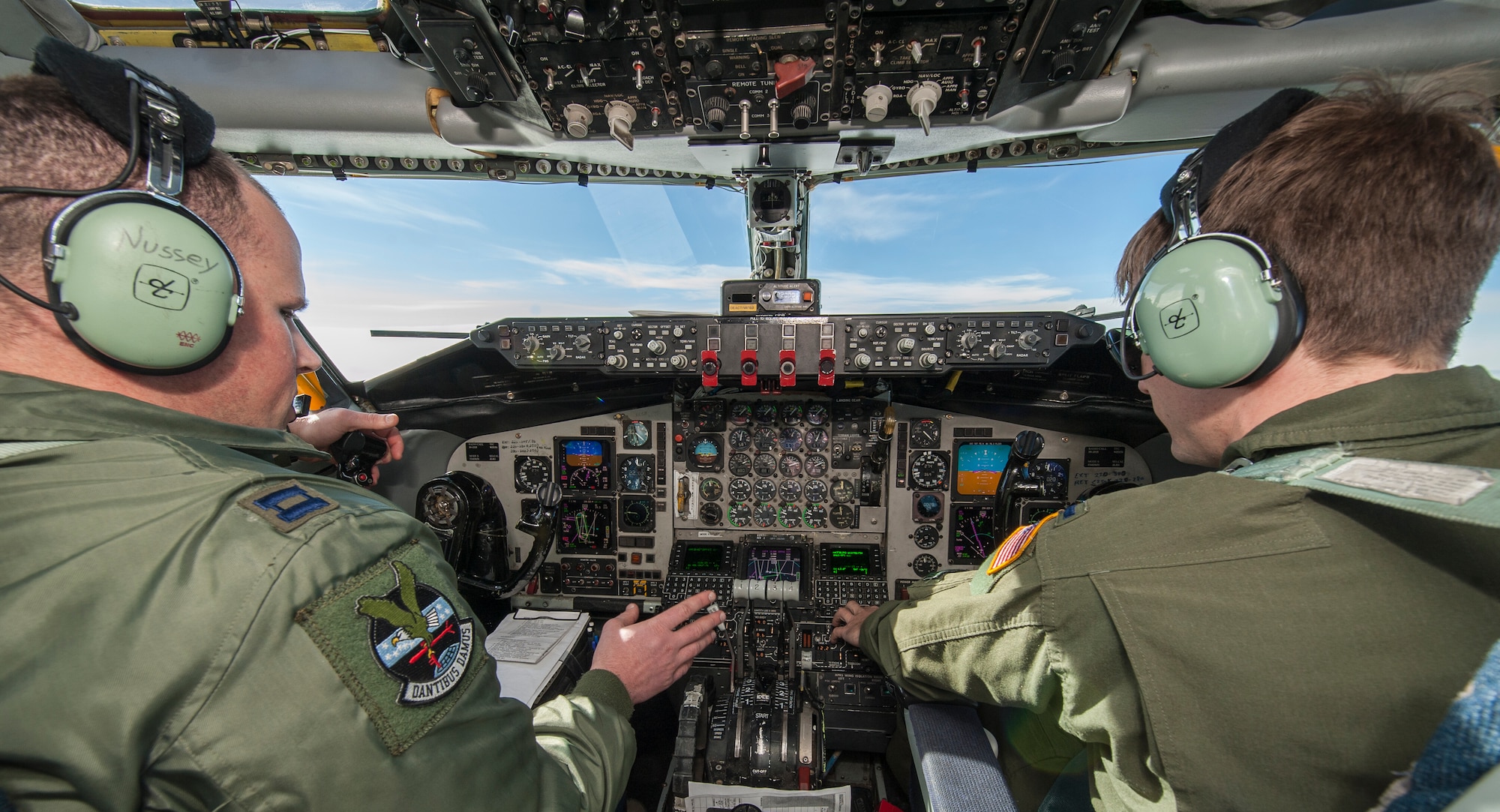Capt. James Nussey and 1st Lt. Ross Ostarello bring a 92nd Air Refueling Wing KC-135 Stratotanker up to altitude during an air refueling mission and incentive flight over Oregon and California, March 26, 2014. Incentive flights are designed as an opportunity for pilots and boom operators to show other Airmen the importance they play in fueling the fight for freedom. Nussey and Ostarello are 92nd Air Refueling Squadron KC-135 pilots. Nussey hails from San Angelo, Texas, and Ostarello is from Monterey, Calif. (U.S. Air Force photo by Staff Sgt. Benjamin W. Stratton)