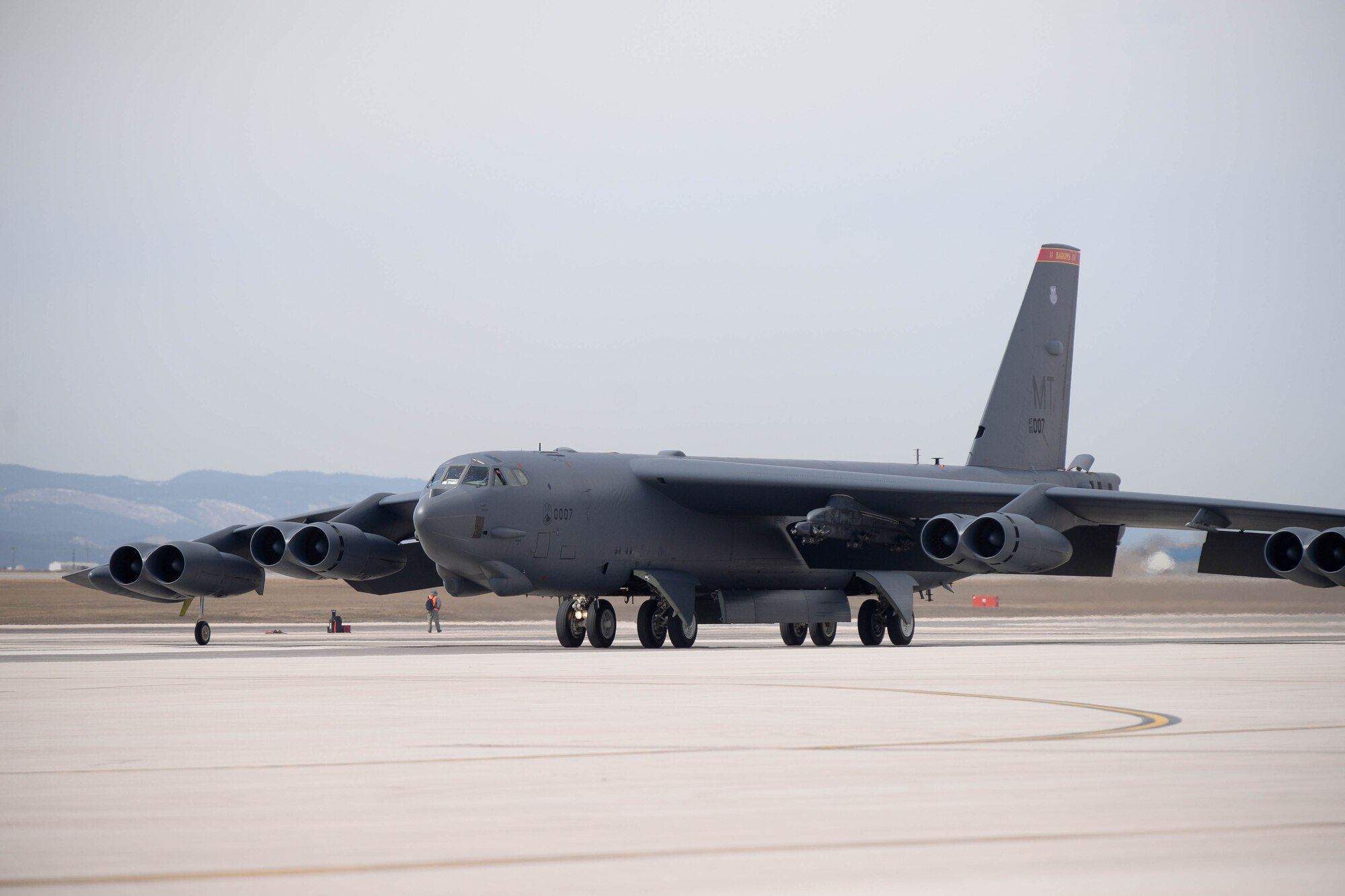 A B-52H Stratofortress from the 5th Bomb Wing at Minot Air Force Base, N.D., arrives at Ellsworth AFB, S.D., March 26, 2014. Approximately eight B-52s and about 300 Airmen from Minot will be on temporary duty at Ellsworth until October due to a much-needed runway reconstruction project at Minot. (U.S. Air Force photo by Senior Airman Zachary Hada/Released)