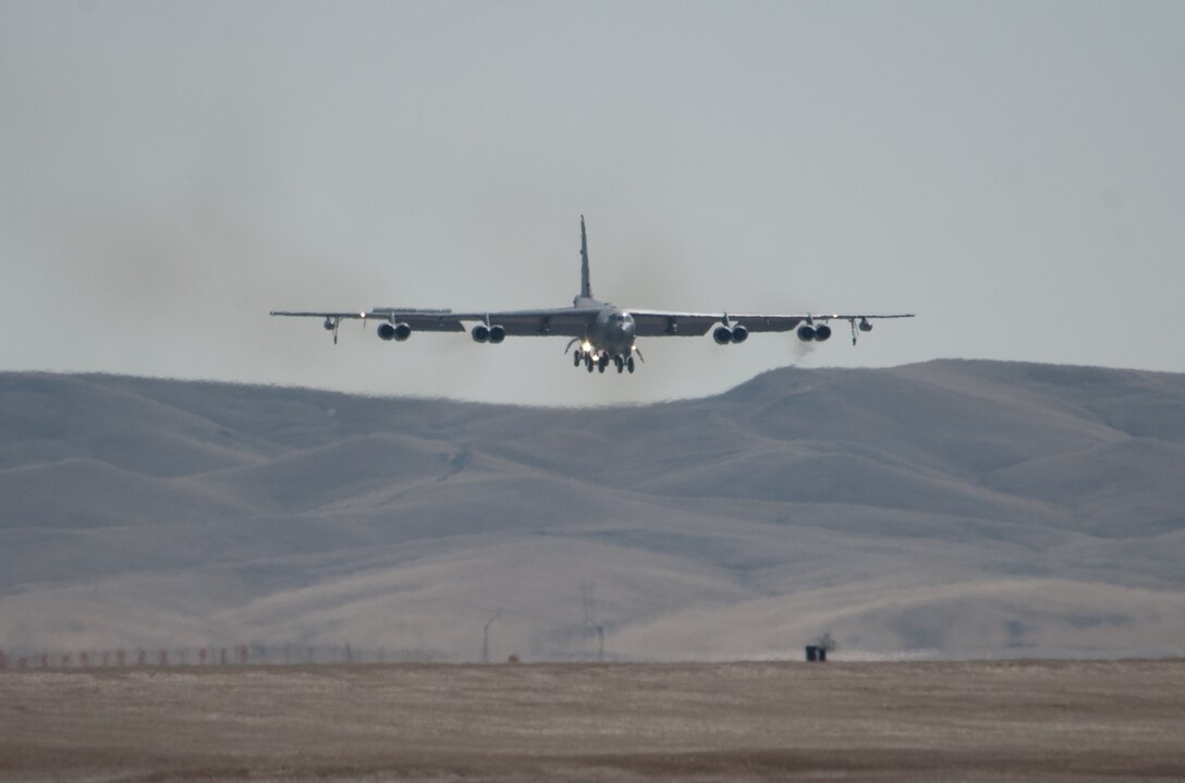 A B-52H Stratofortress from the 5th Bomb Wing at Minot Air Force Base, N.D. lands at Ellsworth AFB, S.D., March 26, 2014. Due to a runway reconstruction, approximately eight B-52 aircraft and 300 Airmen from Minot will be temporarily operating out of Ellsworth for six months to ensure the B-52 maintains its mission capability until the runway project is complete. (U.S. Air Force photo by Senior Airman Alystria Maurer/Released)