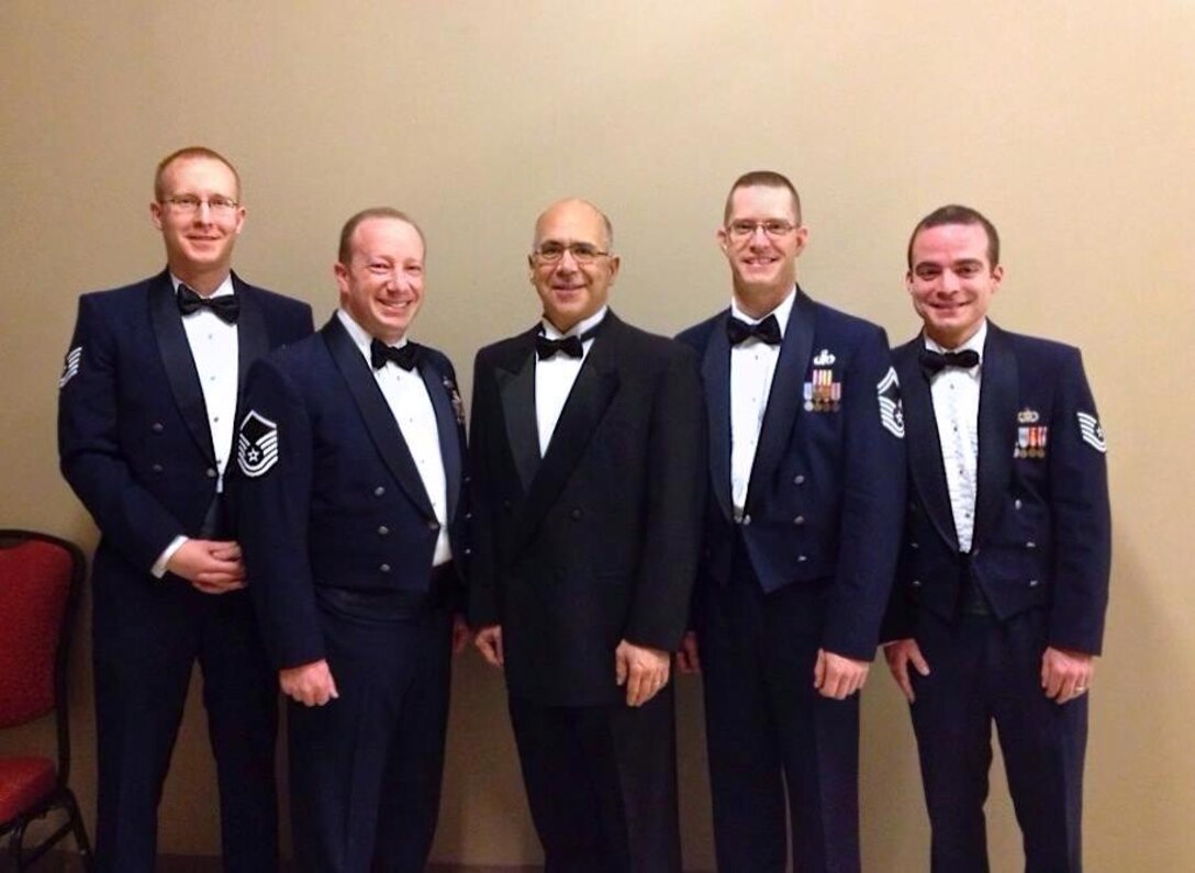 The USAF Concert Band performed with world famous trombonist Joe Alessi at the American Bandmaster's Association conference in Montgomery, AL on March 7.  He is pictured here with the Concert Band trombone section. (US Air Force Photo/released)