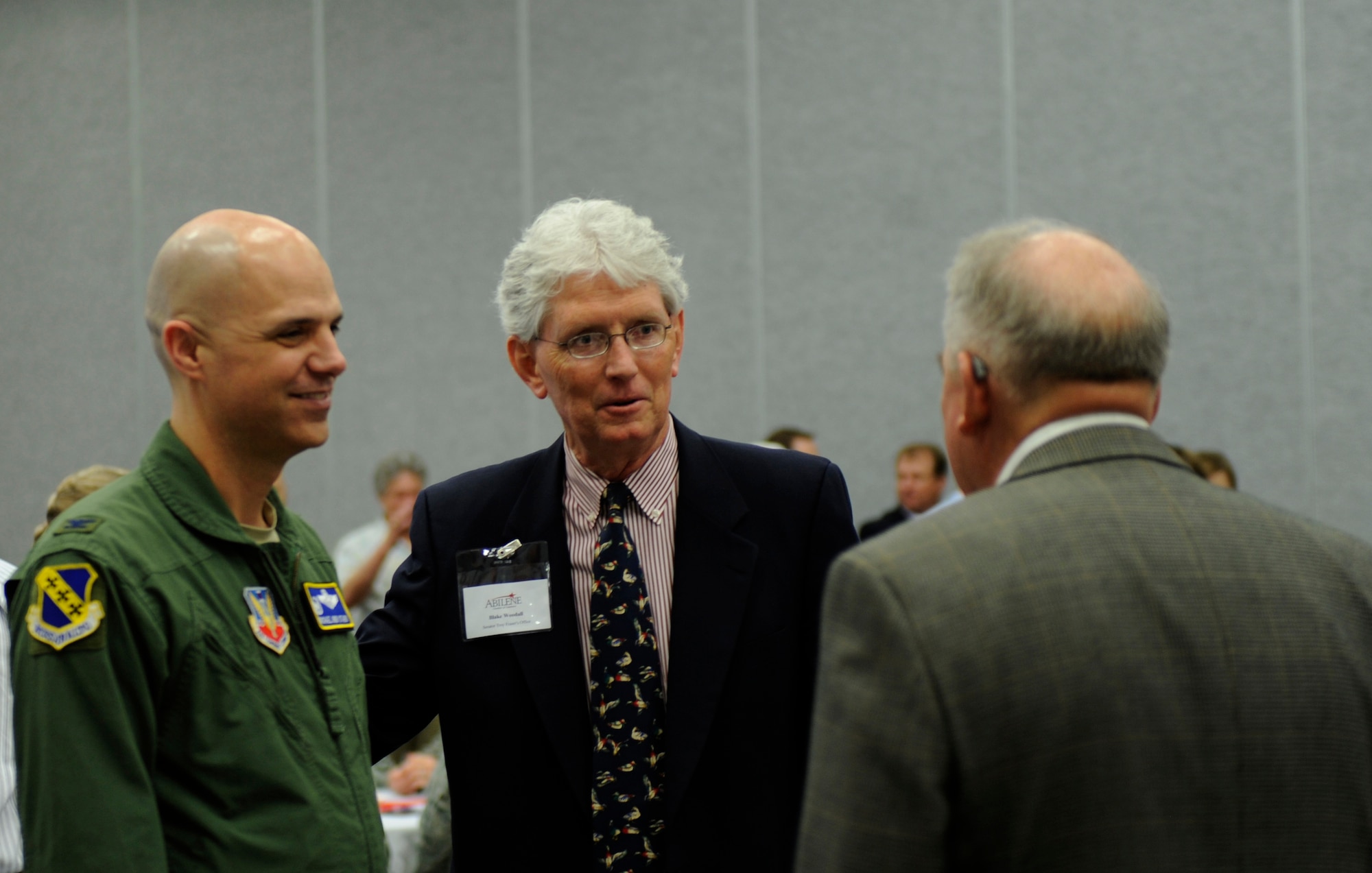 U.S. Air Force Col. Michael Bob Starr, 7th Bomb Wing commander, speaks with Abilene civic leaders during the Military Affairs Committee luncheon March 21, 2014, at the Abilene Civic Center in Abilene, Texas. The MAC’s objective is to build and maintain a strong relationship between Abilene and its military community. (U.S. Air Force photo by Airman 1st Class Alexander Guerrero/Released)