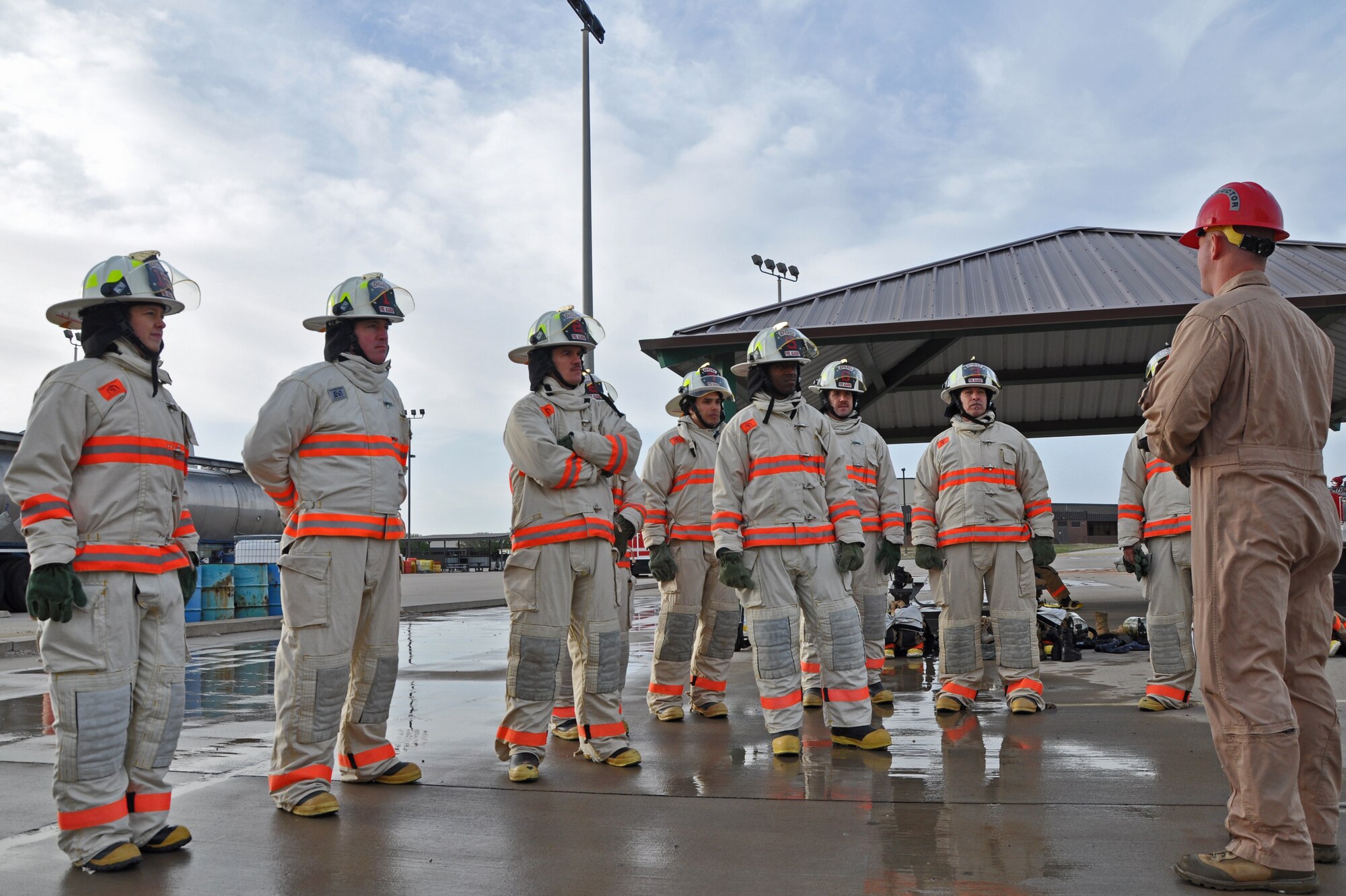GOODFELLOW AIR FORCE BASE, Texas – Marine Corps Sgt. Wesley D. Barker, Marine Corps Detachment and Louis F. Garland DOD Fire Academy instructor, briefs Fire Marshal Course students on the burn house here March 19. The purpose of the Fire Marshal Course is to train officers or civilians assuming command over a DOD fire emergency service program. (U.S. Air Force photo/ Airman 1st Class Breonna Veal)