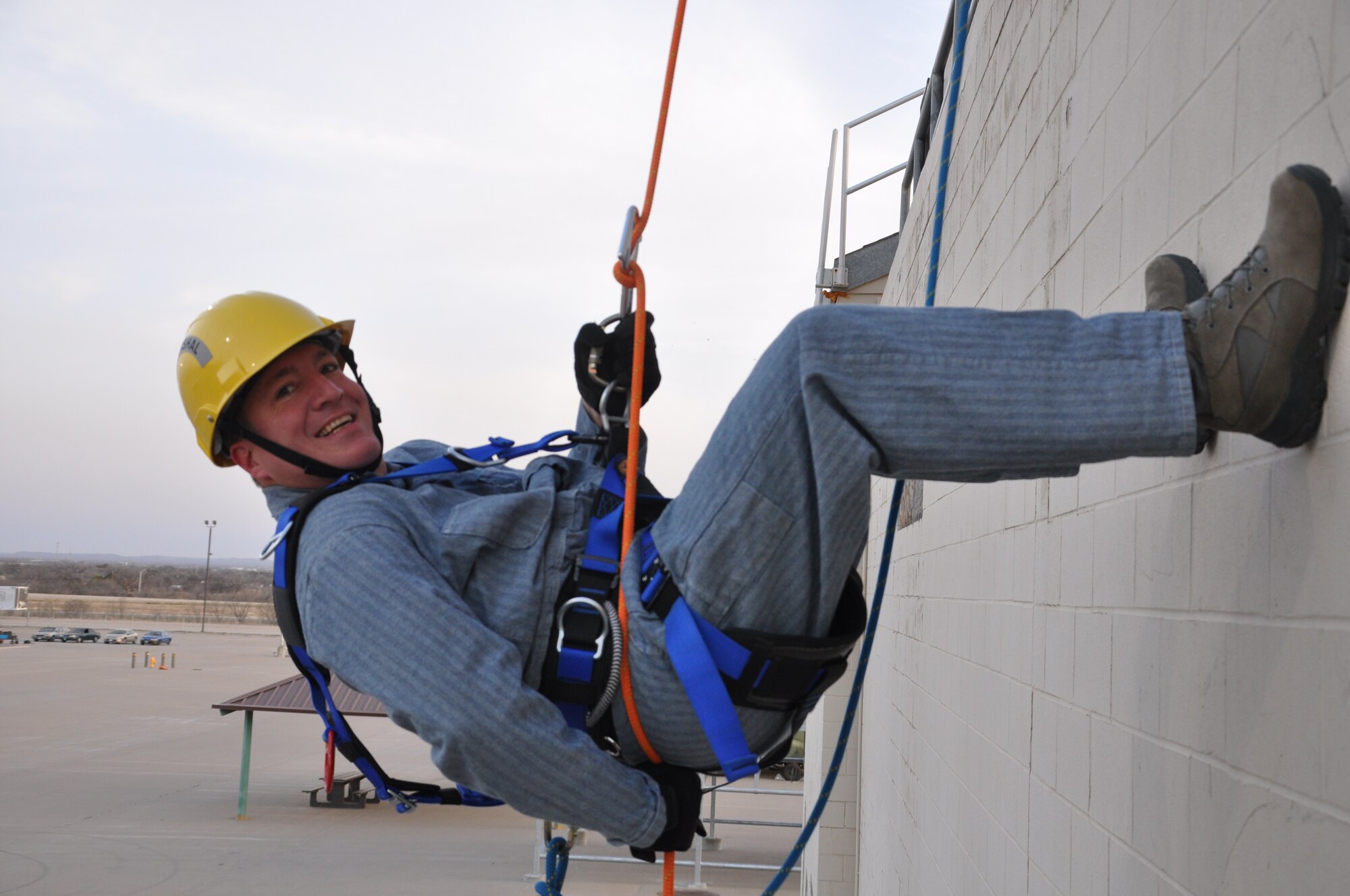 GOODFELLOW AIR FORCE BASE, Texas- Col. Dominic J. Bernardi III, 17th Mission Support Group Commander, rappels down the resue tower during the Fire Marshal Course at the Louis F. Garland DOD Fire Academy here March 19. The course aims to show Fire Emergency Service leaders programs the responsibilities and challenges within today’s FES. (U.S. Air Force photo/ Airman 1st Class Erica Rodriguez)
