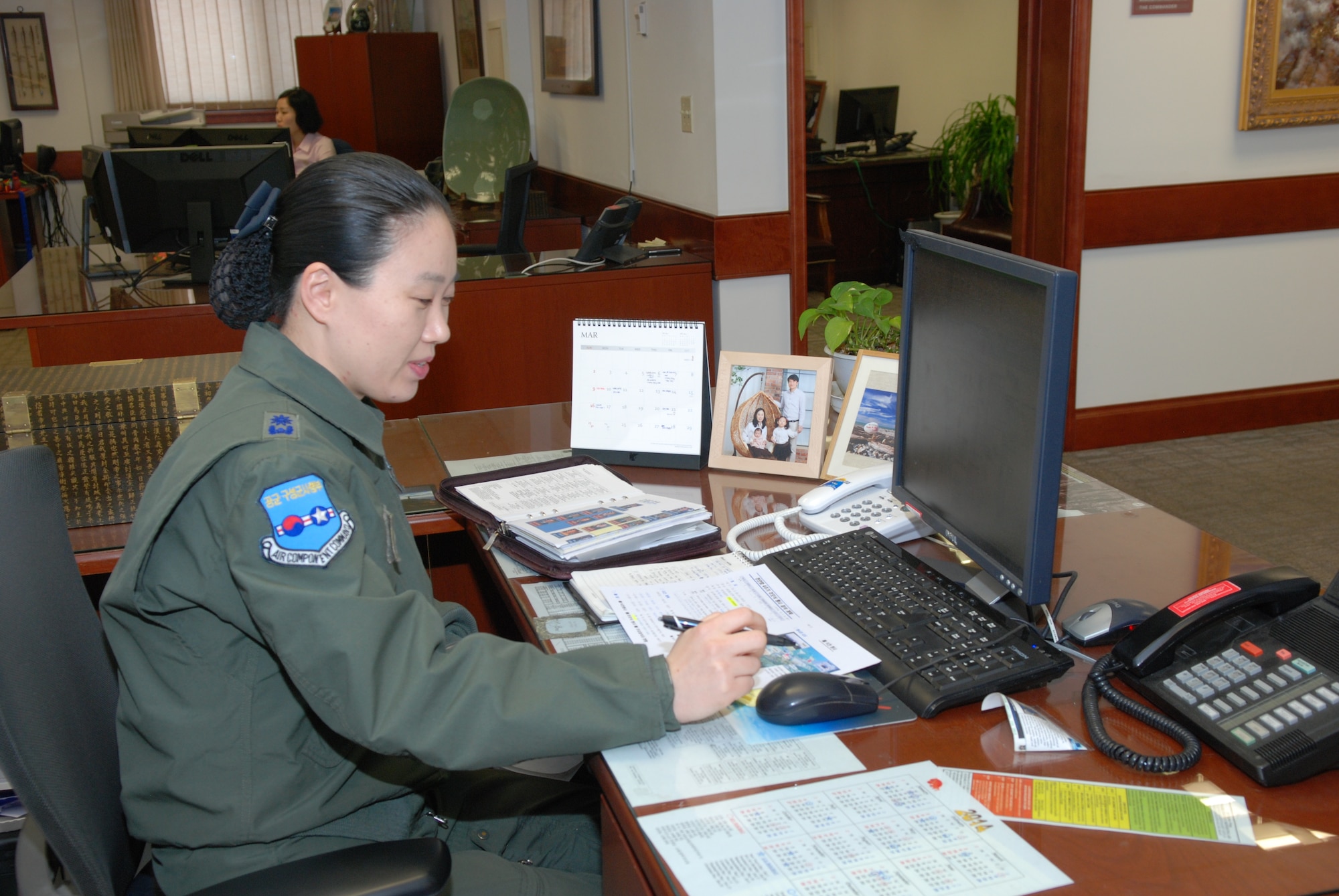 OSAN AIR BASE, Republic of Korea - Republic of Korea Air Force Maj. Lim, Su-Young, ROKAF aide to the U.S. 7th Air Force commander, was one of the first 18 female graduates of the ROK Air Force Academy in 2001 as well as one of their first female pilots. She spent nine years flying the O-2 and the KA-1 attack aircraft before coming to Osan to work on Lt. Gen. Jan-Marc Jouas's staff. (U.S. Air Force photo by Tech. Sgt. Thomas J. Doscher)