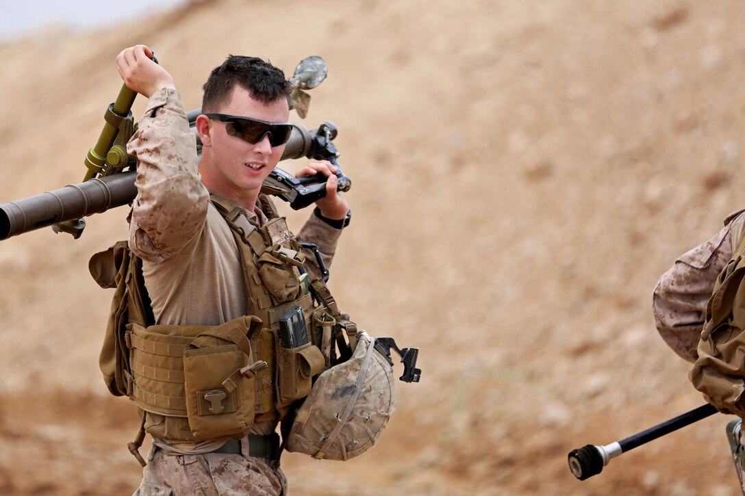 U.S. Marine Corps Lance Cpl. Keith Carpenter carries an M224 60-mm mortar system tube during training to maintain weapons proficiency on Camp Leatherneck, Helmand province, Afghanistan, March 16, 2014. Carpenter is a mortarman assigned to Bravo Company, 1st Battalion, 9th Marine Regiment.