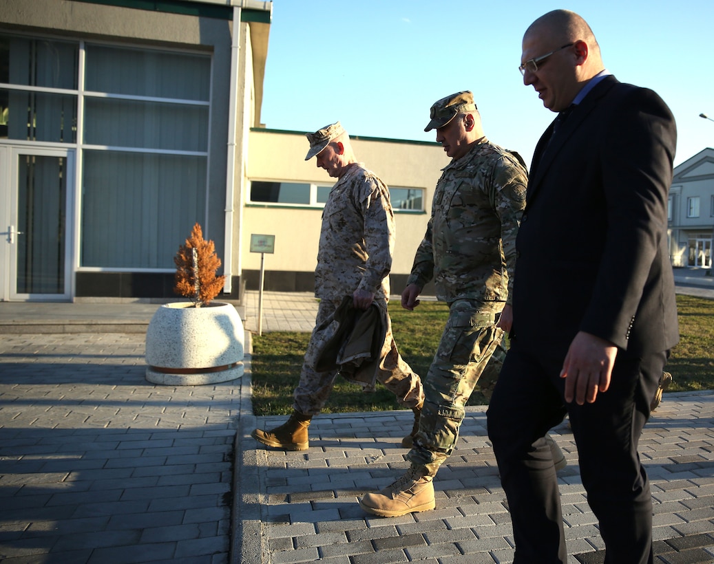 United States Marine Corps Lt. Gen. Richard Tryon (left), commander of U.S. Marine Corps Forces Command and U.S. Marine Corps Forces, Europe, Georgian Maj. Gen. Vakhtang Kapanadze (middle), the Georgian chief of defense, and Zurab Agladze, the rector of the Georgian National Defense Academy tour the NDA facilities with March 19, 2014. Tryon visited Georgia to attend the departure ceremony of Georgian Special Mountain Battalion and 23rd Bn., who are deploying to Afghanistan as part of the International Security Assistance Force, and he also toured the NDA during his visit. (Official Marine Corps photo by Lance Cpl. Scott W. Whiting, BSRF PAO/ Released)