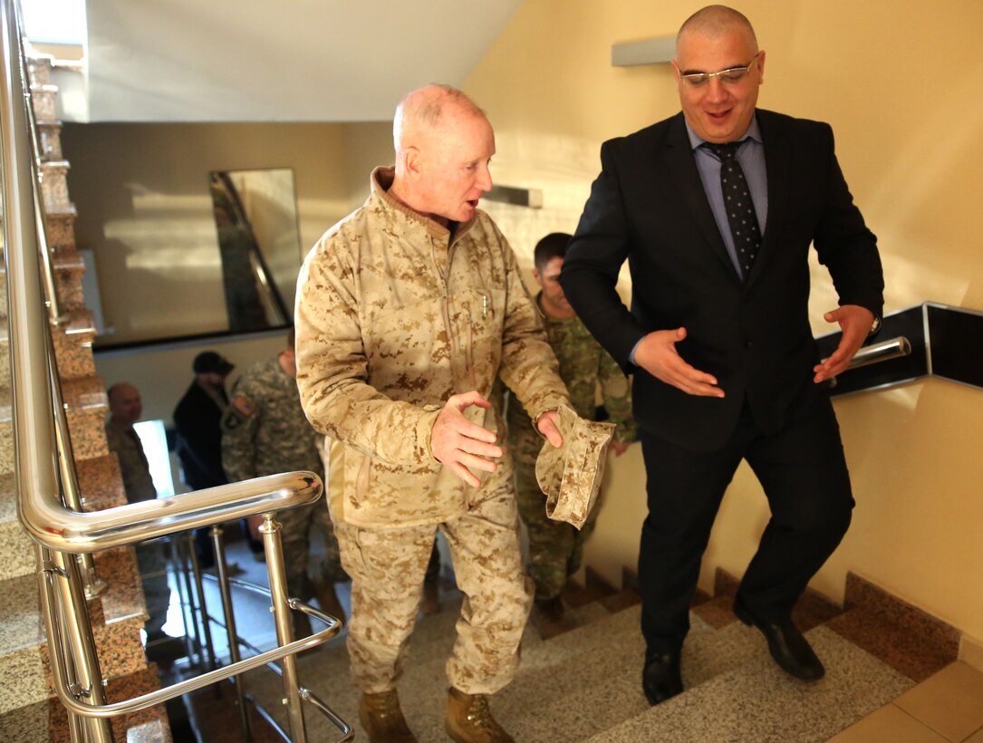 United States Marine Corps Lt. Gen. Richard Tryon, commander of U.S. Marine Corps Forces Command and U.S. Marine Corps Forces, Europe, tours the Georgian National Defense Academy facilities with Zurab Agladze, the rector of the NDA March 19, 2014. Tryon visited Georgia to attend the departure ceremony of Georgian Special Mountain Battalion and 23rd Bn., who are deploying to Afghanistan as part of the International Security Assistance Force, and he also toured the NDA during his visit. (Official Marine Corps photo by Lance Cpl. Scott W. Whiting, BSRF PAO/ Released)