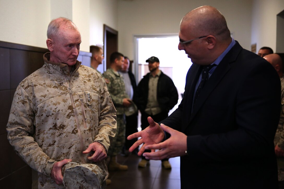 United States Marine Corps Lt. Gen. Richard Tryon, commander of U.S. Marine Corps Forces Command and U.S. Marine Corps Forces, Europe, tours the Georgian National Defense Academy facilities with Zurab Agladze, the rector of the NDA March 19, 2014. Tryon visited Georgia to attend the departure ceremony of Georgian Special Mountain Battalion and 23rd Bn., who are deploying to Afghanistan as part of the International Security Assistance Force, and he also toured the NDA during his visit. (Official Marine Corps photo by Lance Cpl. Scott W. Whiting, BSRF PAO/ Released)