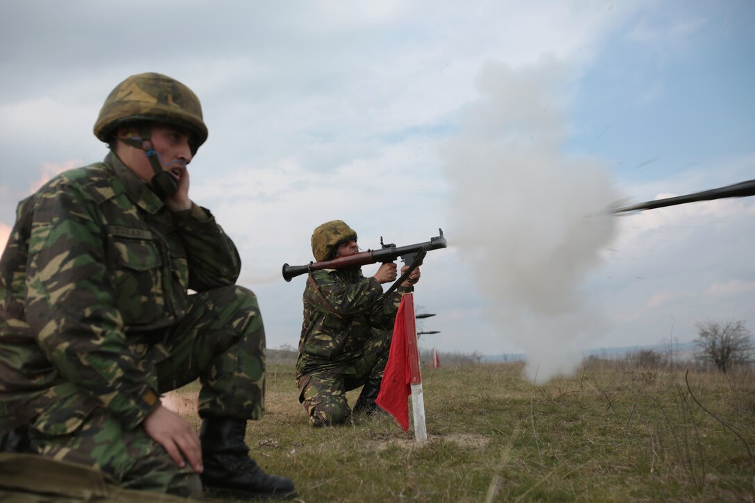 Service members with the Romanian 307th Naval Infantry Battalion,  fire rocket propelled grenades during a combined maneuver live fire exercise at Babadag Training Area, Romania, 26 March, 2014.  Black Sea Rotational Force 14 is a task force of Marines and sailors with the mission to sustain positive relationships with partner nations uphold regional stability and increase military operational capabilities while also proving the ability for rapid crisis response in the Black Sea, Balkan and Caucasus regions of Eastern Europe. (Official Marine Corps photo by Staff Sgt. Tanner M. Iskra, BSRF Combat Camera/Released)