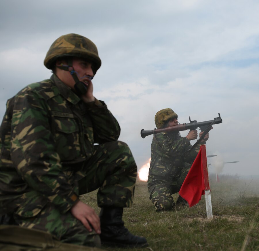 Service members with the Romanian 307th Naval Infantry Battalion,  fire rocket propelled grenades during a combined maneuver live fire exercise at Babadag Training Area, Romania, 26 March, 2014.  Black Sea Rotational Force 14 is a task force of Marines and sailors with the mission to sustain positive relationships with partner nations uphold regional stability and increase military operational capabilities while also proving the ability for rapid crisis response in the Black Sea, Balkan and Caucasus regions of Eastern Europe. (Official Marine Corps photo by Staff Sgt. Tanner M. Iskra, BSRF Combat Camera/Released)