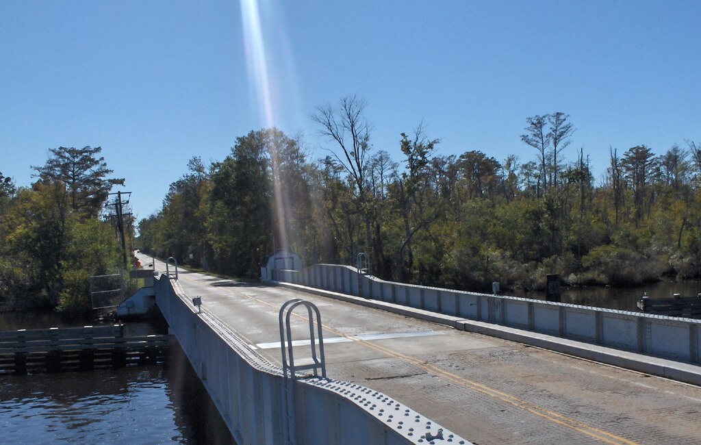 The North Landing Bridge spans the Atlantic Coastal Waterway between Chesapeake, and Virginia Beach, Virginia. The 65 year old dual span swing bridge was hit by a barge in the early morning hours of March 1, 2016.  