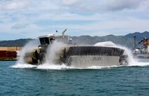 The Ultra Heavy-Lift Amphibious Connector (UHAC) is a 4/10 scale concept demonstrator that weighs in at a "lean" 38 tons and is just under 18" tall. The full scale craft, not yet built, is projected to hit 20 knots at sea and be capable of carrying 3 tanks.

