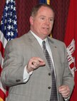Ordnance and Explosives directorate chief Mike hubbard addresses attendees at his March 21 retirement ceremony. With more than 32 years in the federal service and six years at the helm of the Huntsville Center  directorate responsible for safely eliminating or reducing risks from ordnance, explosives and recovered chemical warfare materiel, Hubbard said he never dreamed he would stay that long (in civil service) but he was captivated by the culture. 