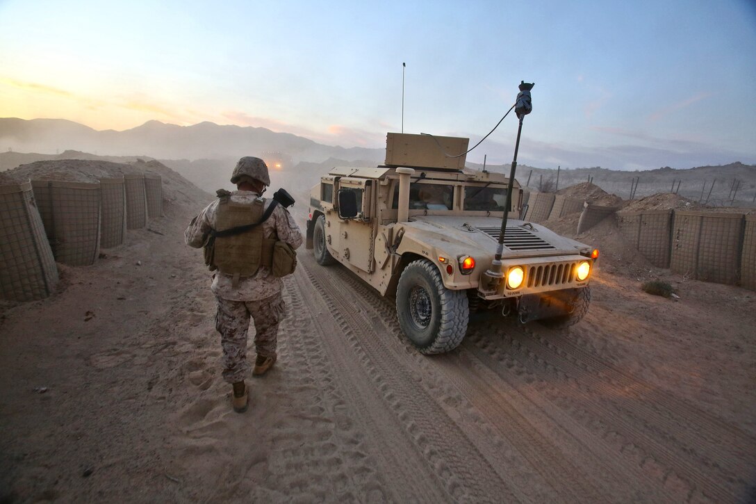 Marines from Combat Logistics Battalion 1, Combat Logistics Regiment 1, 1st Marine Logistics Group, return from a Combat Logistics Patrol Exercise during Integrated Training Exercise 3-14 aboard Marine Corps Air Ground Combat Center Twentynine Palms, Calif., March 21, 2014. The month-long ITX prepares the battalion for its role, as the logistics combat element, in the final combat deployment of Operation Enduring Freedom. During the CLPX, Marines practiced and were evaluated on scenarios that included indirect and direct fire, improvised explosive devices and casualty 
evacuations.