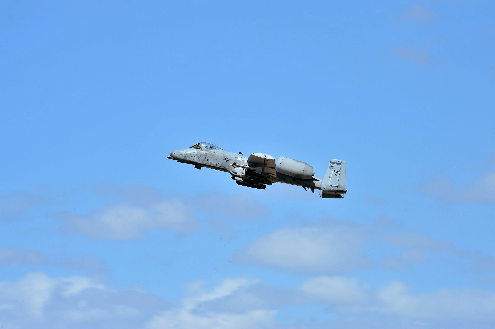 An A-10 Thunderbolt departs for a training mission at Davis-Monthan Air Force Base, Ariz., March 27, 2014.  The A-10 Thunderbolt has excellent maneuverability at low air speeds and altitude, and is an highly accurate weapons-delivery platform. (U.S. Air Force photo by Senior Airman Josh Slavin/Released)