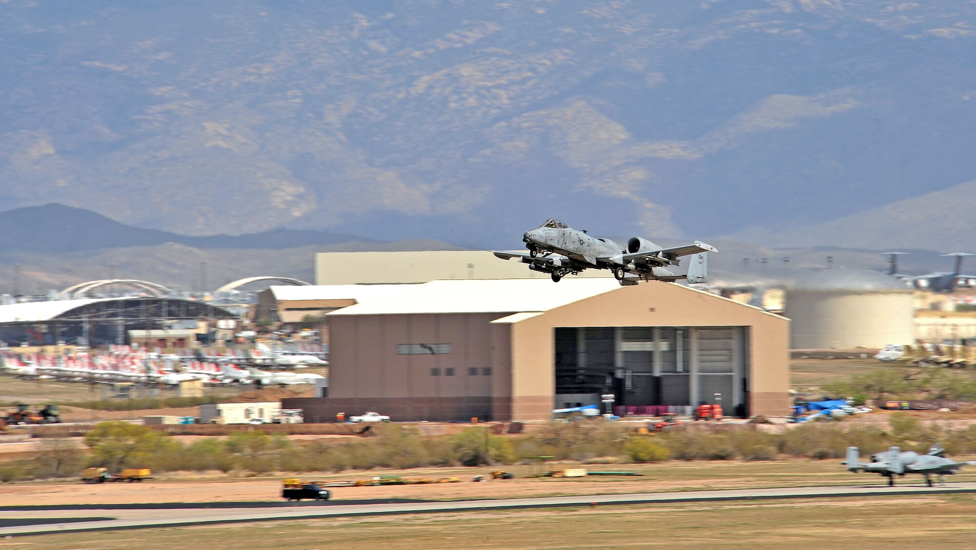 An A-10 Thunderbolt departs for a training mission at Davis-Monthan Air Force Base, Ariz., March 27, 2014. The A-10 is the first Air Force aircraft specially designed for close air support of ground forces. (U.S. Air Force photo by Senior Airman Josh Slavin/Released)