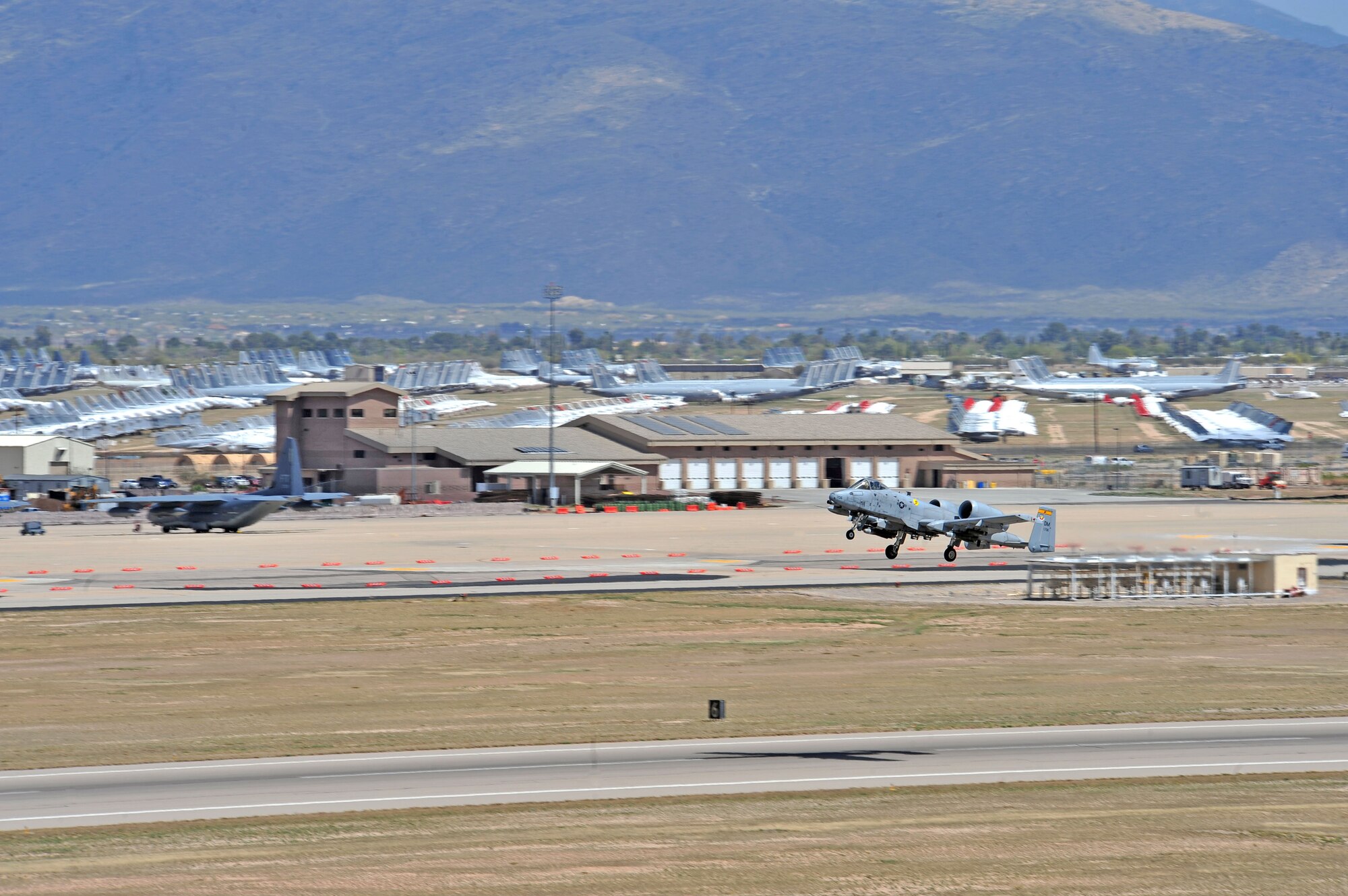 An A-10 Thunderbolt departs for a training mission at Davis-Monthan Air Force Base, Ariz., March 27, 2014. D-M is responsible for training more than 100 A-10 pilots per year. (U.S. Air Force photo by Senior Airman Josh Slavin/Released)