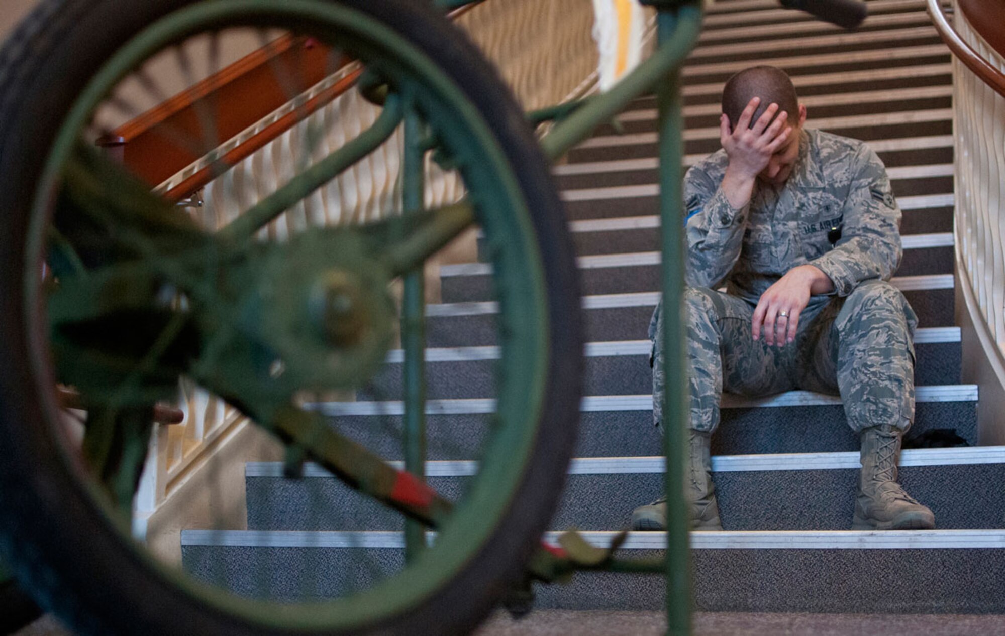 JOINT BASE ELMENDORF–RICHARDSON, Alaska--Airman 1st Class Matthew Rappisi, a medical technician with Joint Base Elmendorf-Richardson, Alaska’s 673d Medical Group, rests on a stairway near the triage entrance of the base hospital between waves of simulated earthquake casualties Thursday, March 27, 2014, during JBER's Mission Assurance Exercise 14-3. MAE 14-3 is a JBER exercise testing the base’s ability to survive, operate and coordinate during a major natural disaster.  (U.S. Air Force photo/Justin Connaher)