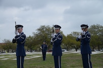 The Joint Base San Antonio-Randolph Honor Guard performs a 3-round volley rifle tribute to honor former Vietnam War prisoners of war and those who remain missing in action during the 41st Freedom Flyer Reunion Wreath-laying Ceremony March 28 at Washington Circle. Annually, the Freedom Flyers return to JBSA-Randolph to share their stories and visit the site where they received their flying recertification, or their final flight, after their return from prisoner-of-war status. (U.S. Air Force photo by Joel Martinez)